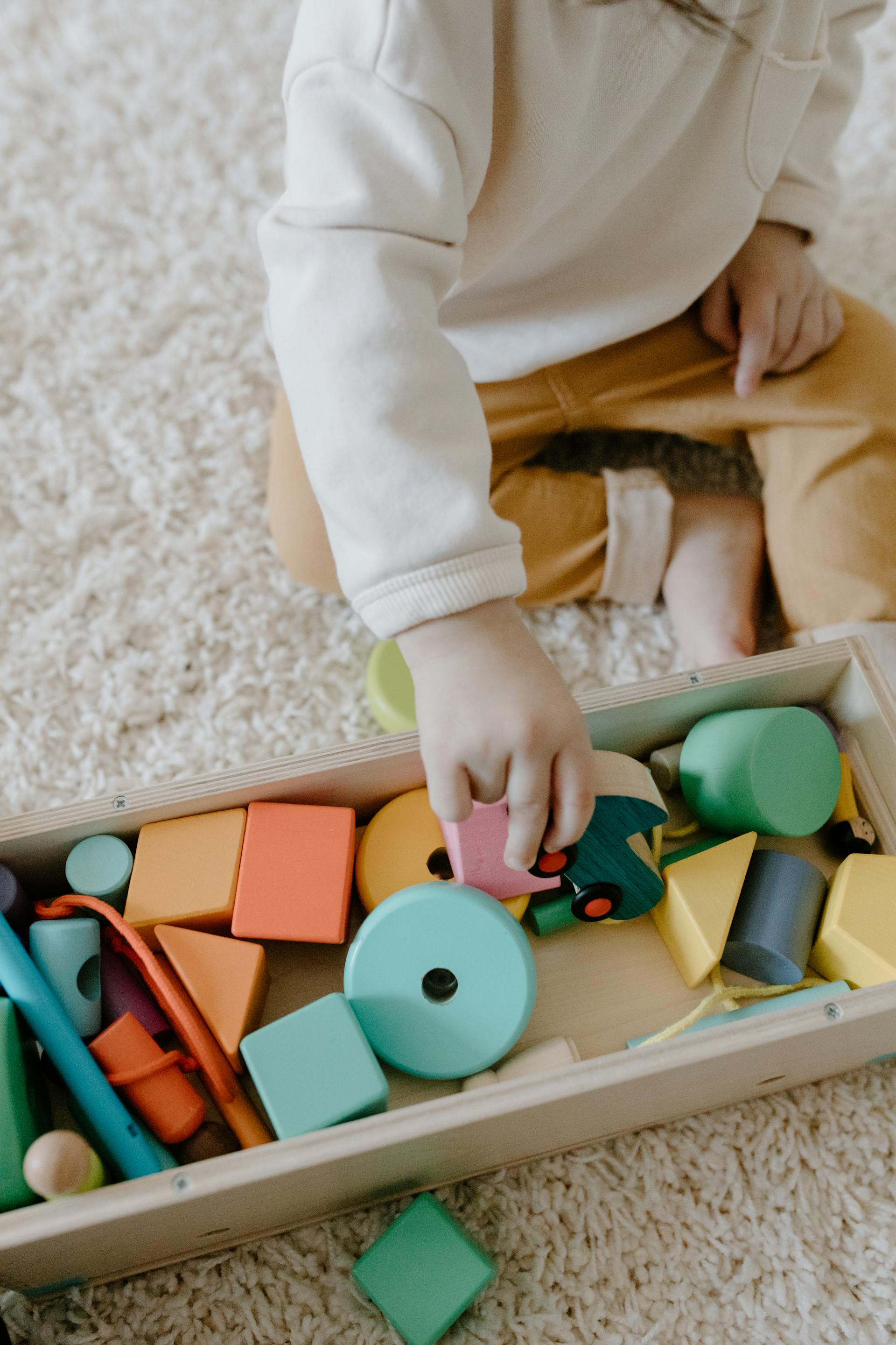 A child playing with toys | Source: Pexels