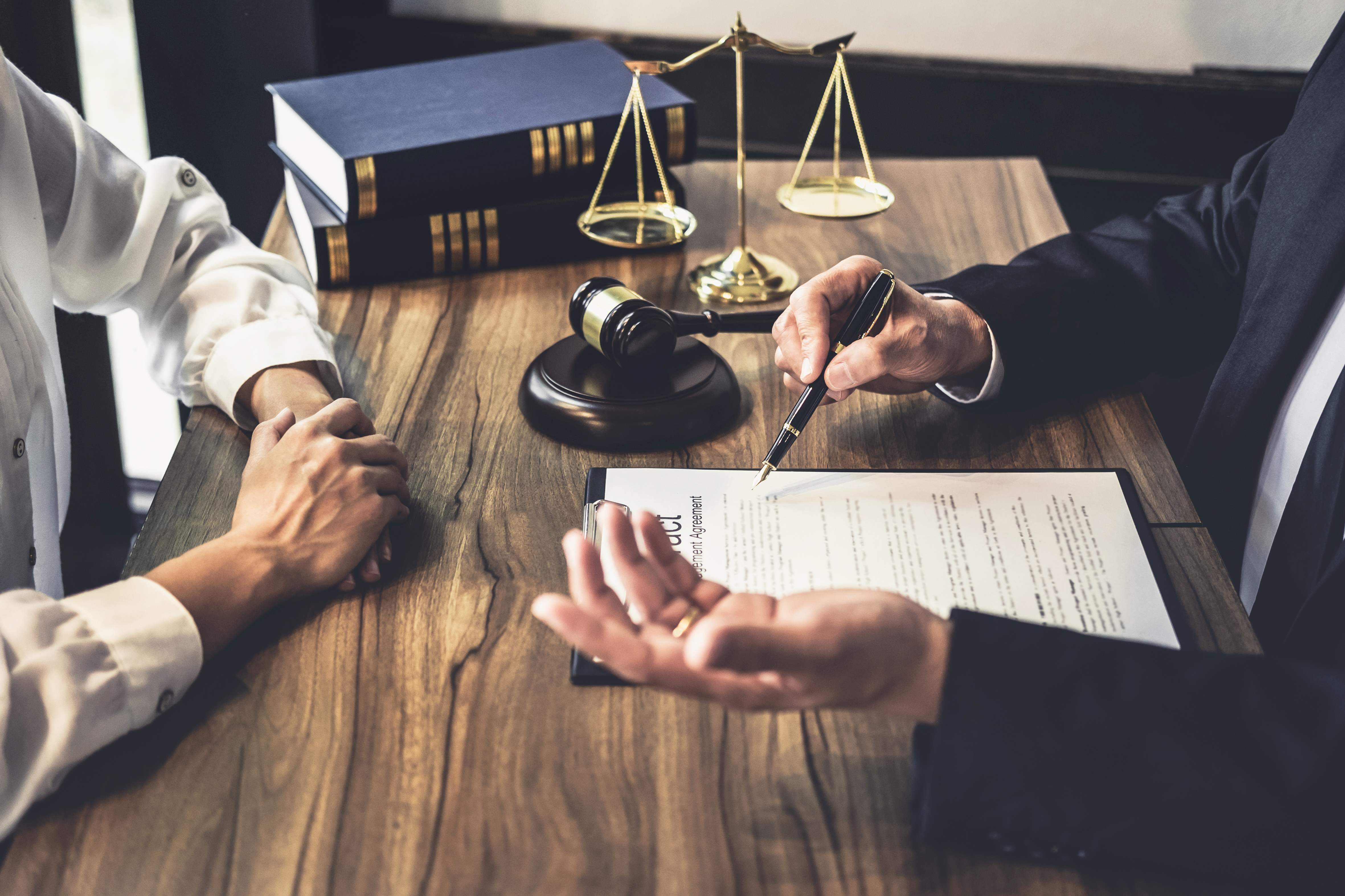 A lawyer talking to a man | Source: Shutterstock