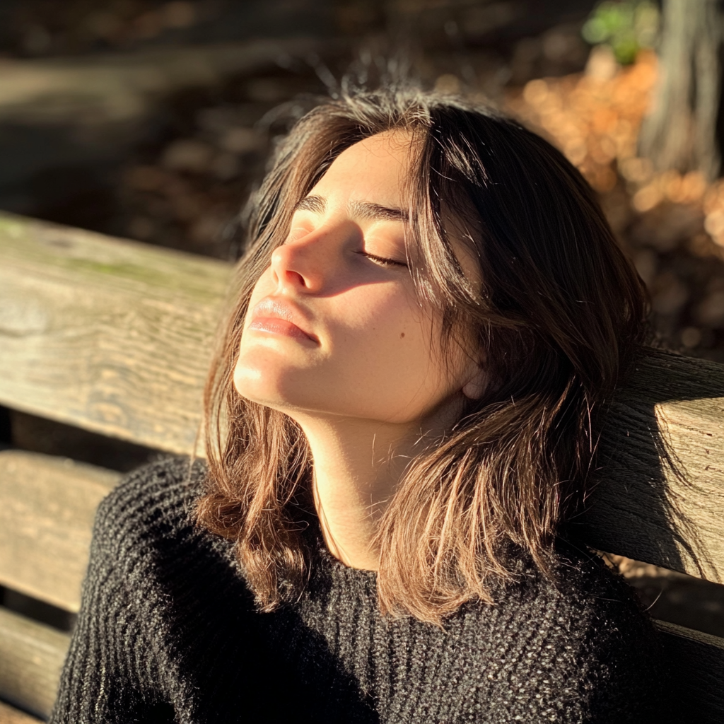 A young woman sitting on a bench | Source: Midjourney