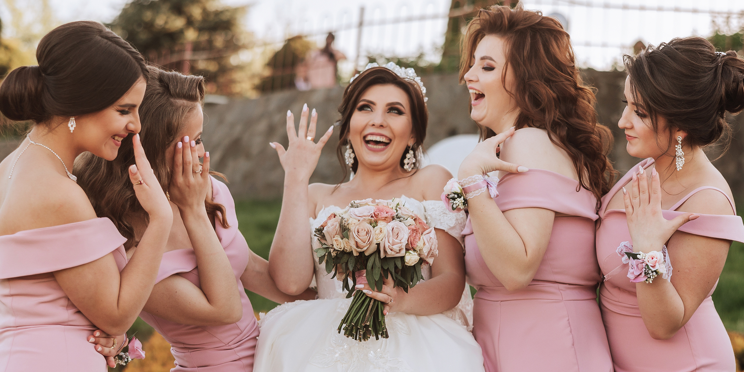 A happy bride with her bridesmaids | Source: Shutterstock