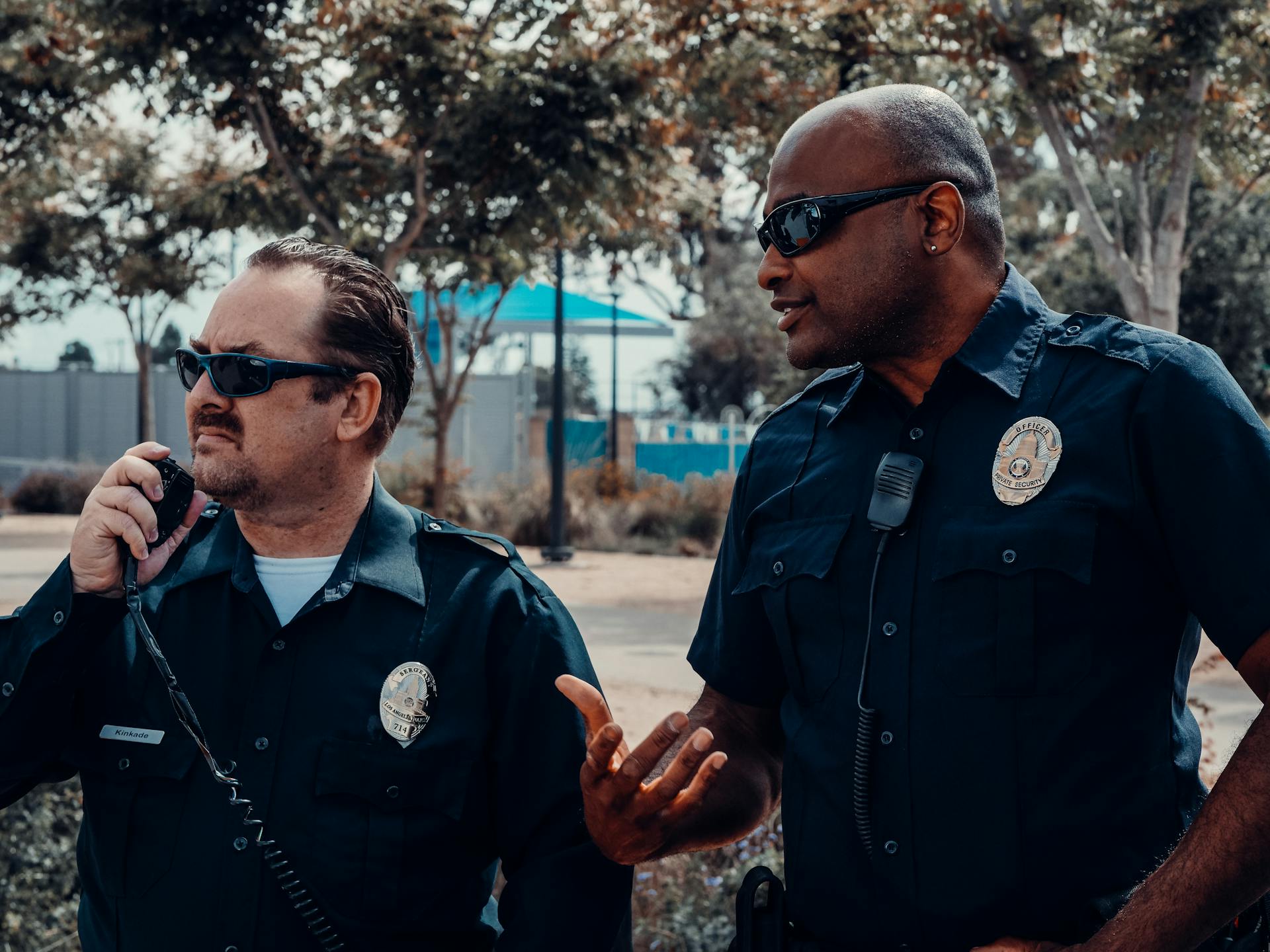 A photo showing two police officers outside a house | Source: Pexels