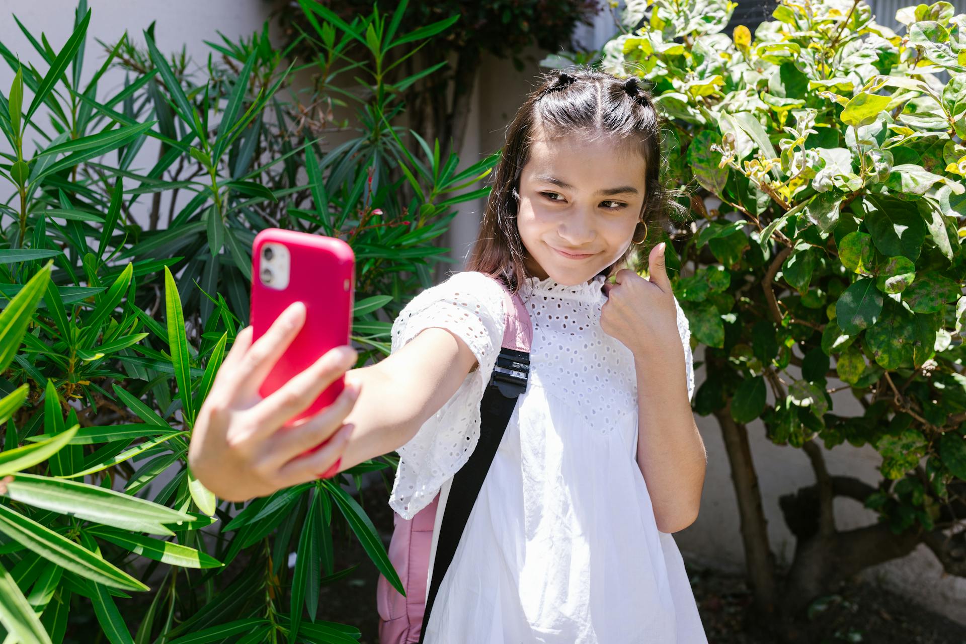 A young teen girl using her cell phone | Source: Pexels