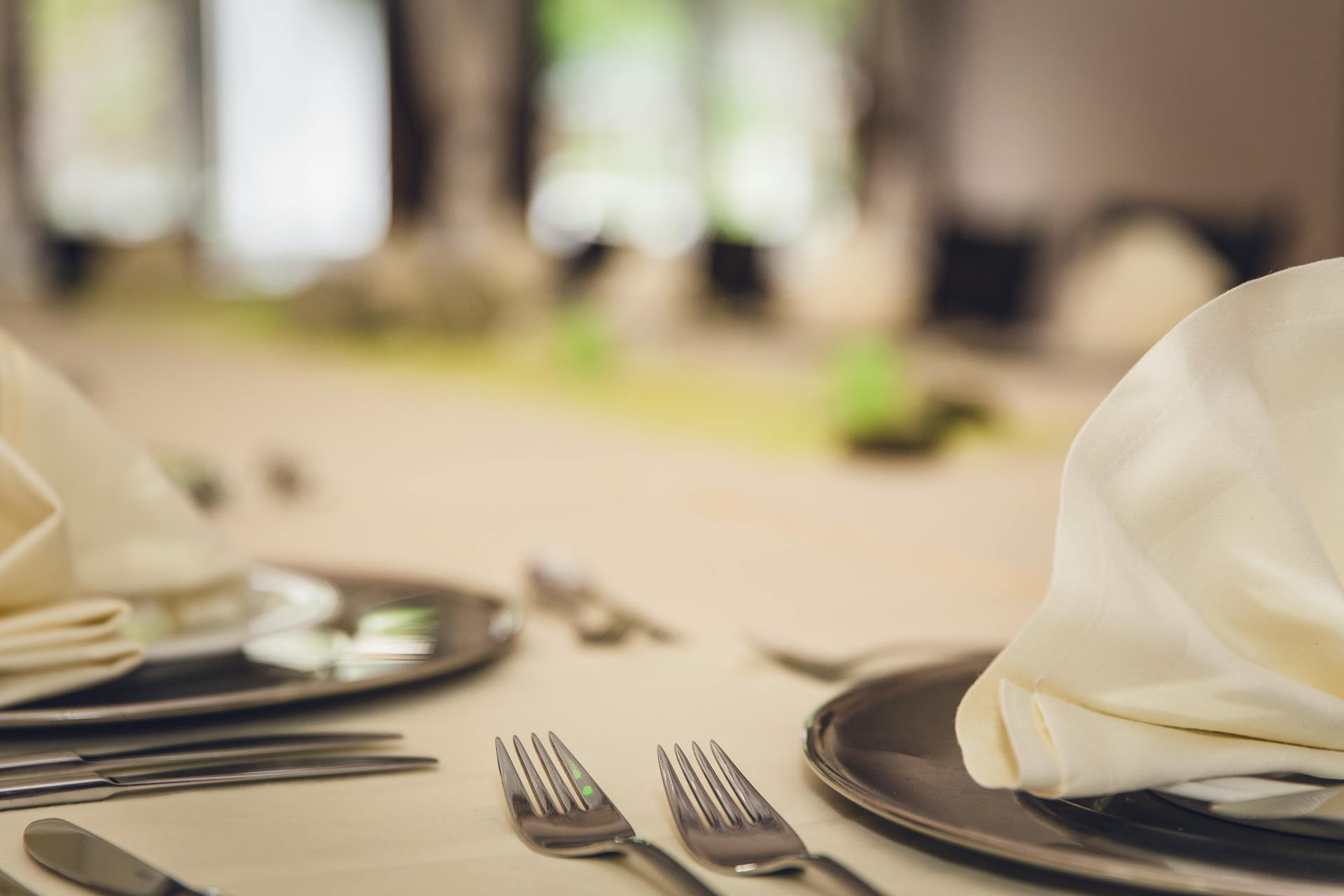 A close-up shot of cutlery on a dinner table | Source: Pexels