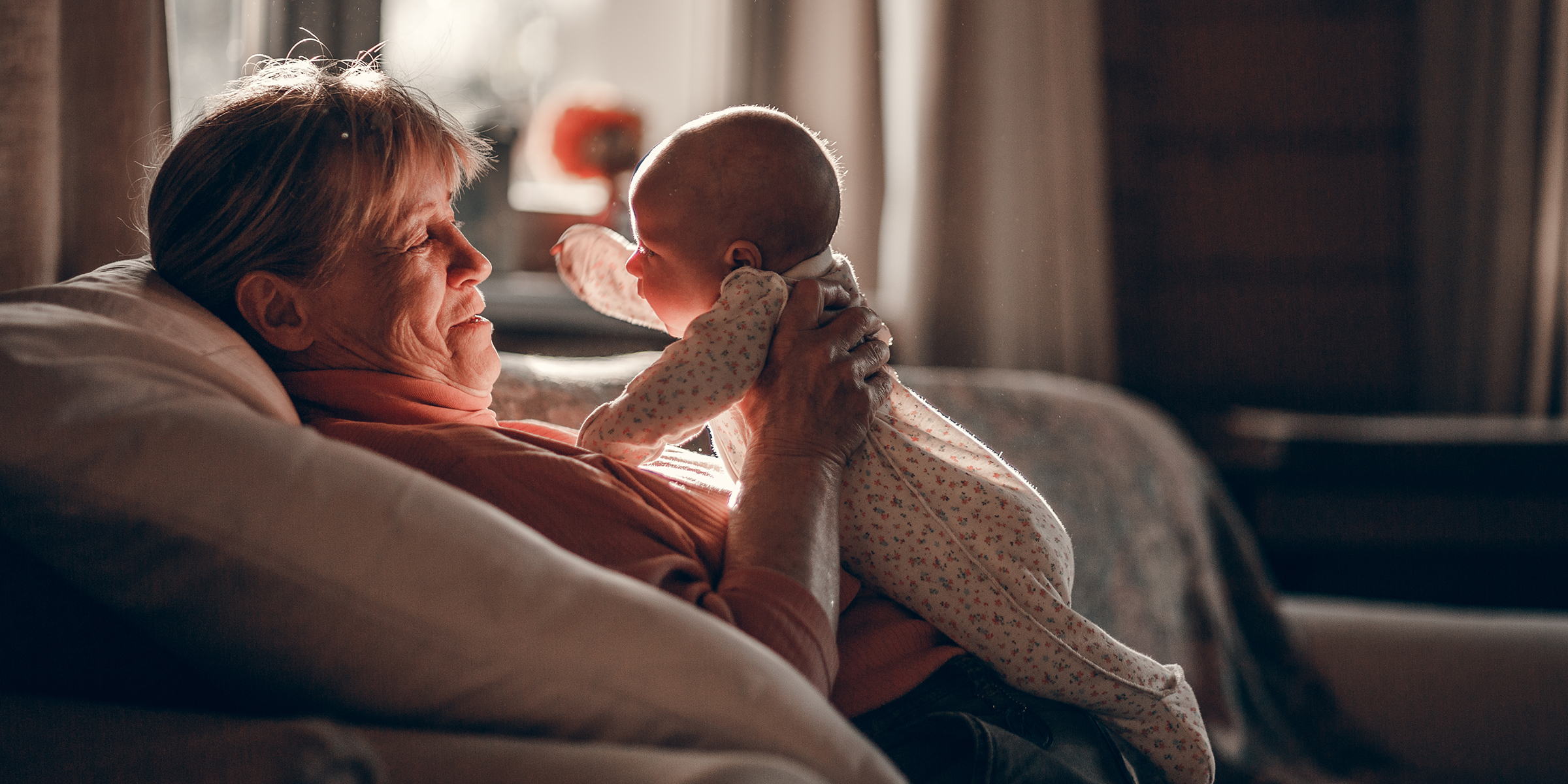 An older woman babysitting | Source: Shutterstock