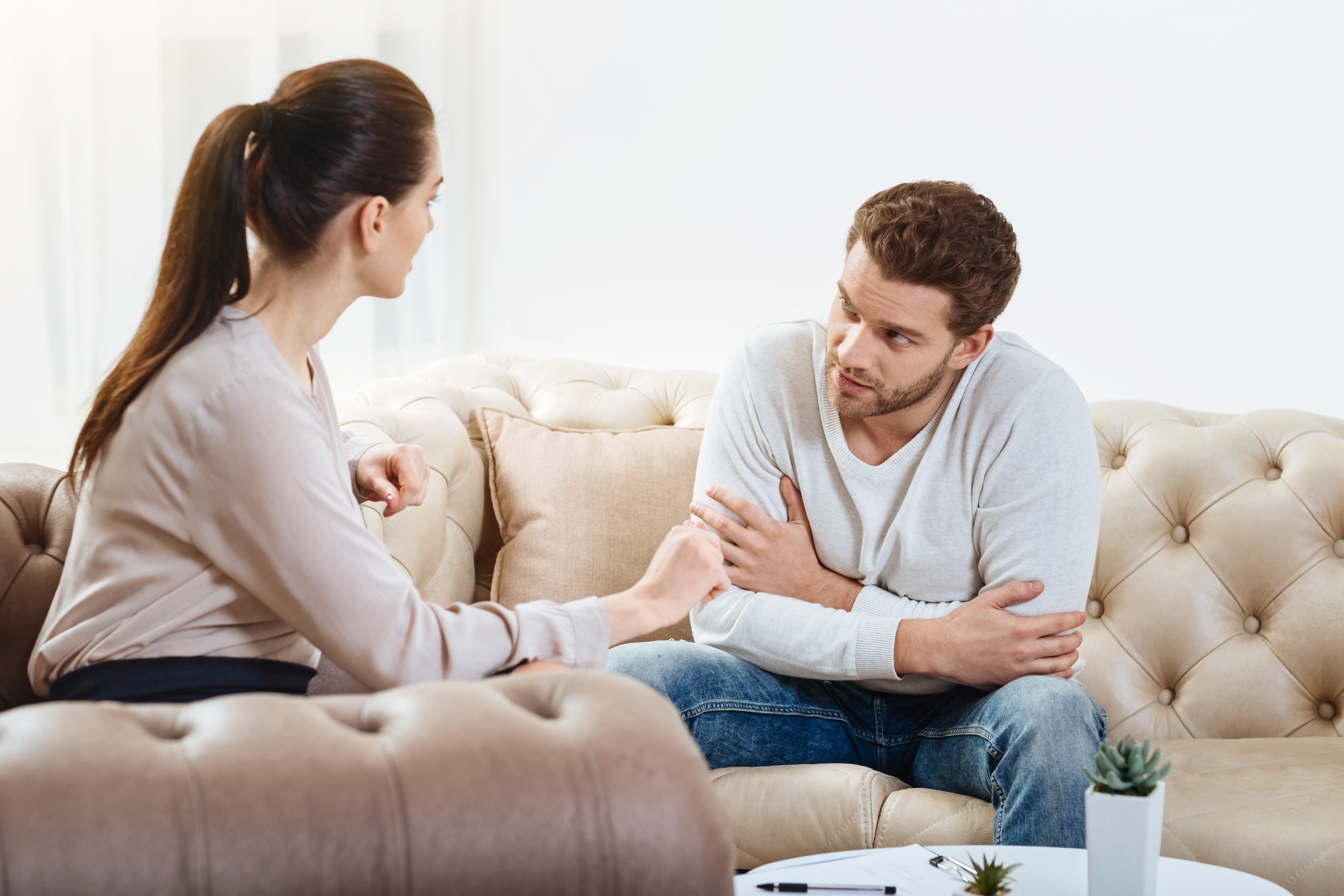 A couple having a conversation | Source: Shutterstock