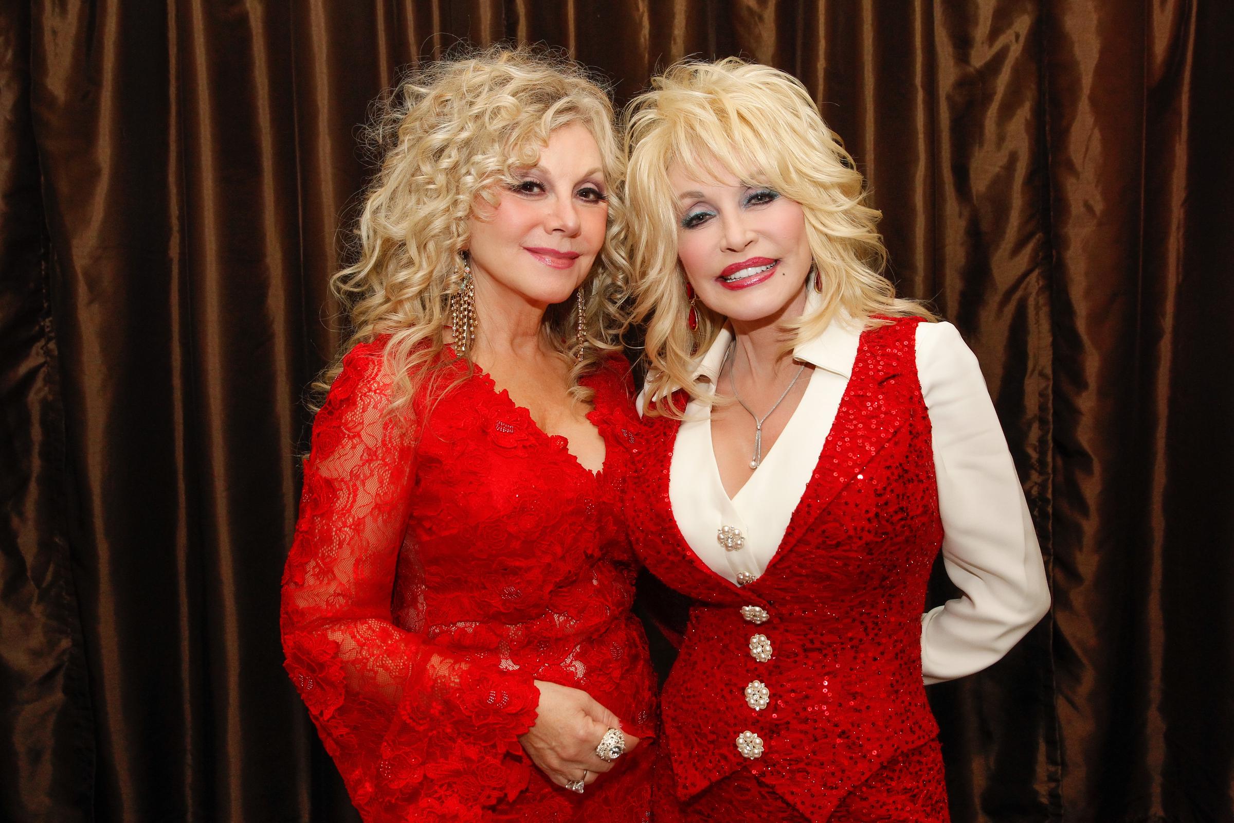 Stella Parton and Dolly Parton attend Stella Parton's Red Tent Women's Conference 2014 at the Doubletree Hotel Downtown on April 18 in Nashville, Tennessee. | Source: Getty Images