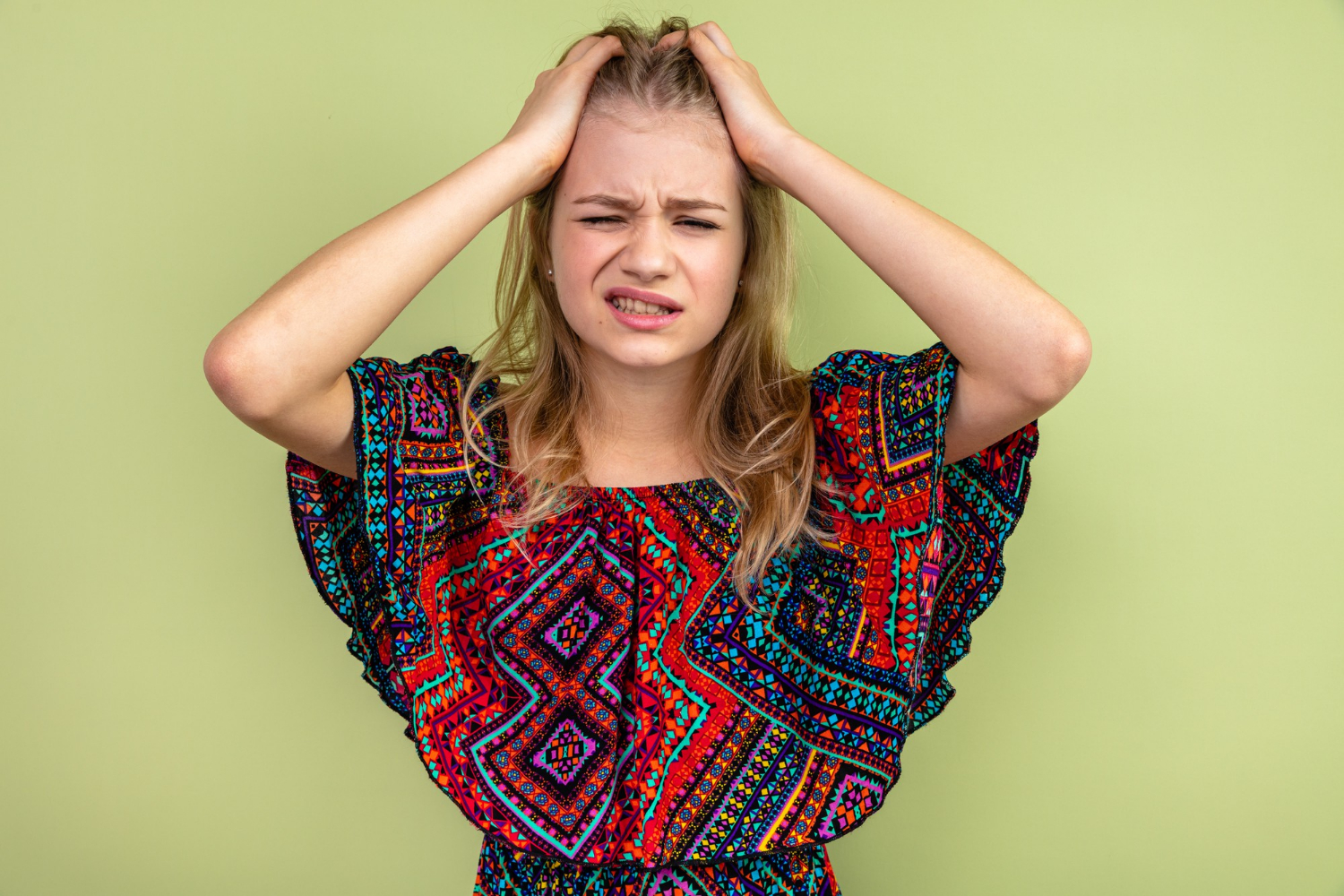 A frustrated teenage girl | Source: Freepik