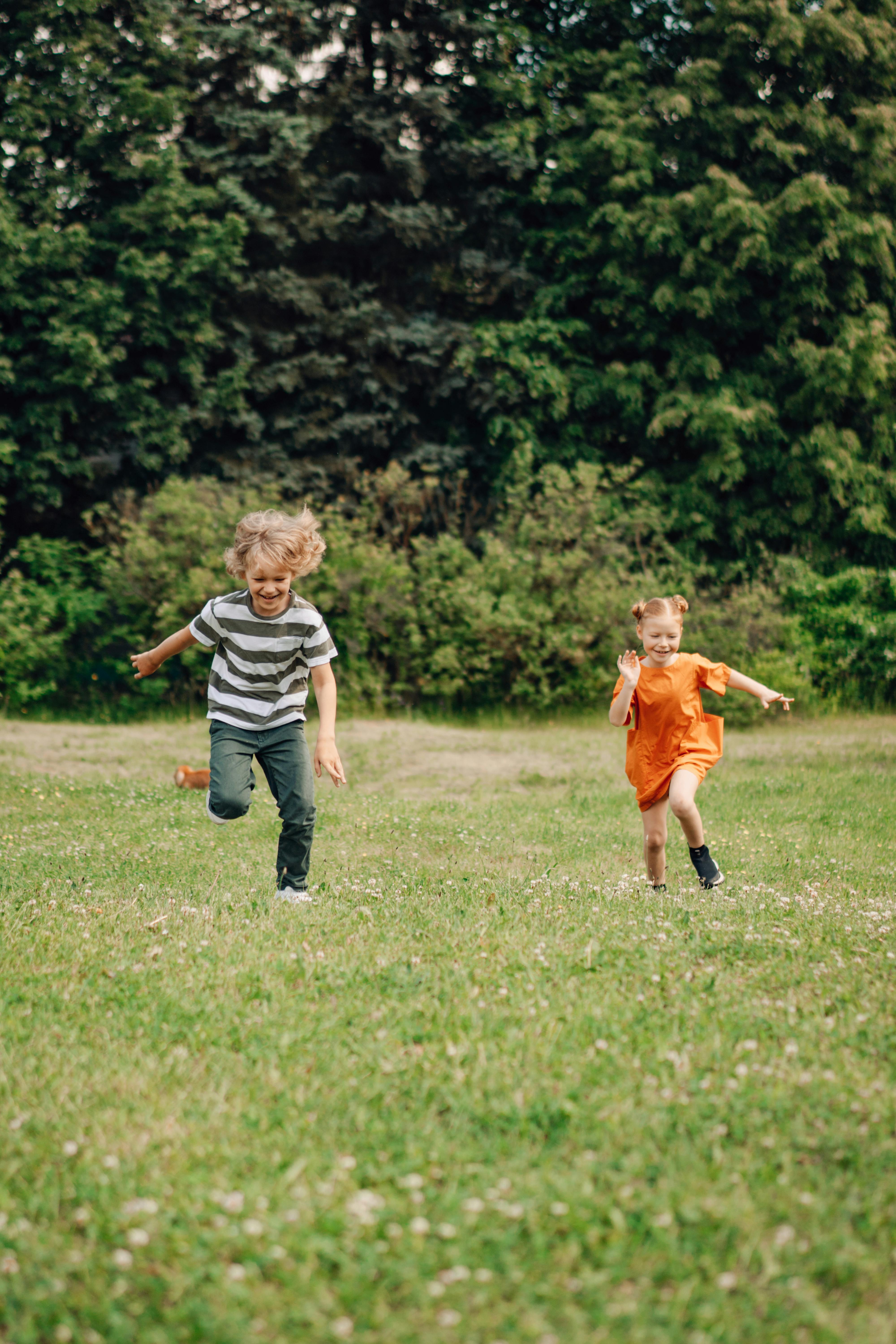 Children playing outdoors | Source: Midjourney