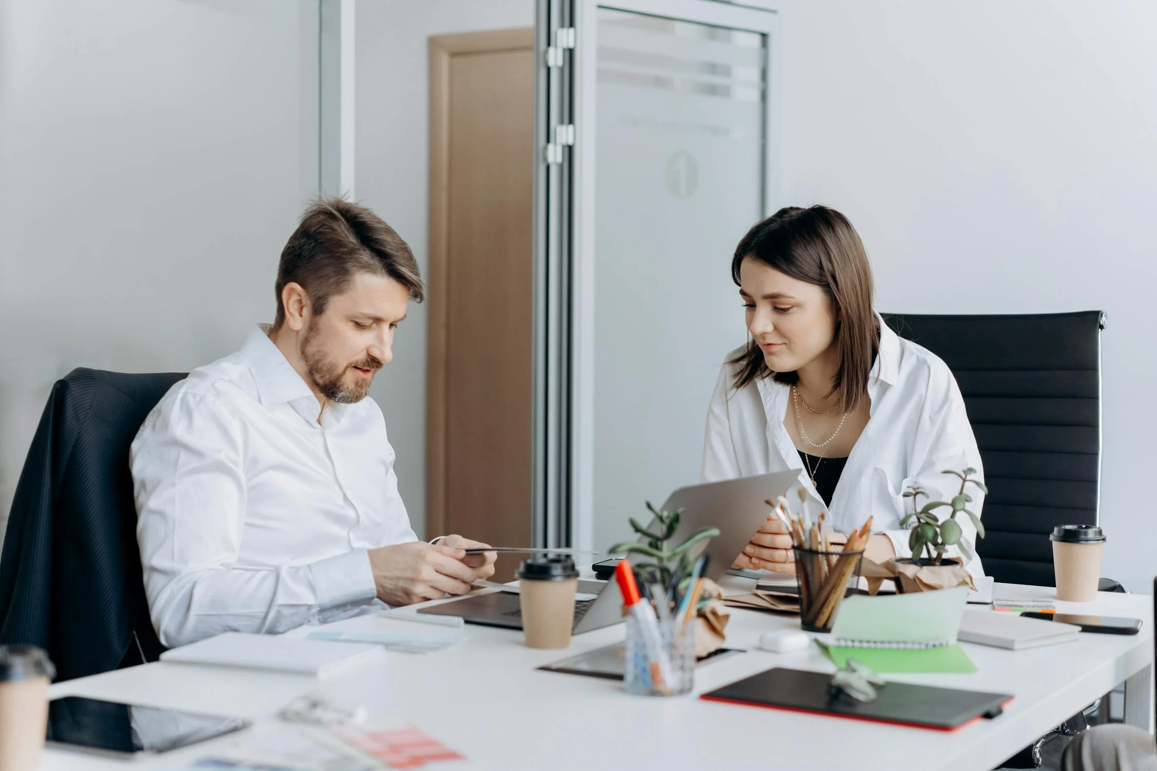 A woman in a metting with her boss | Source: Pexels
