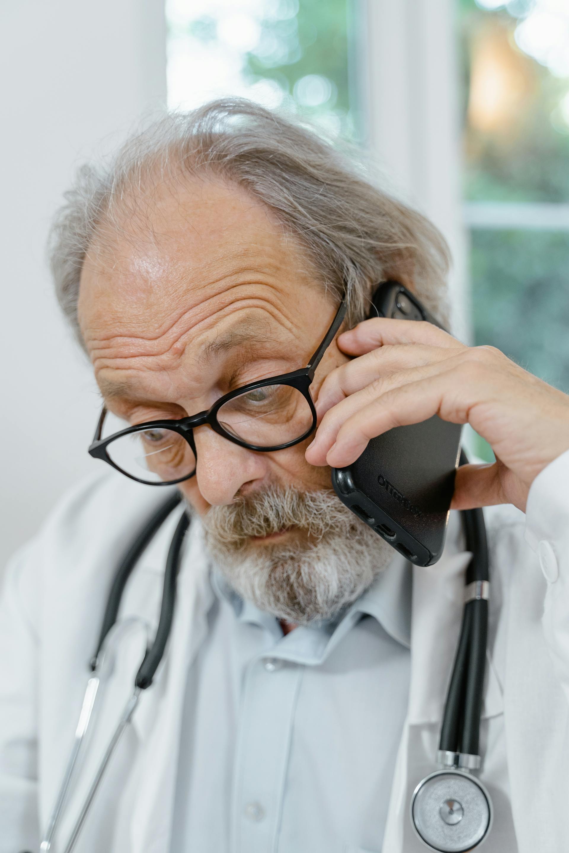 A pharmacist taking a phone call | Source: Pexels