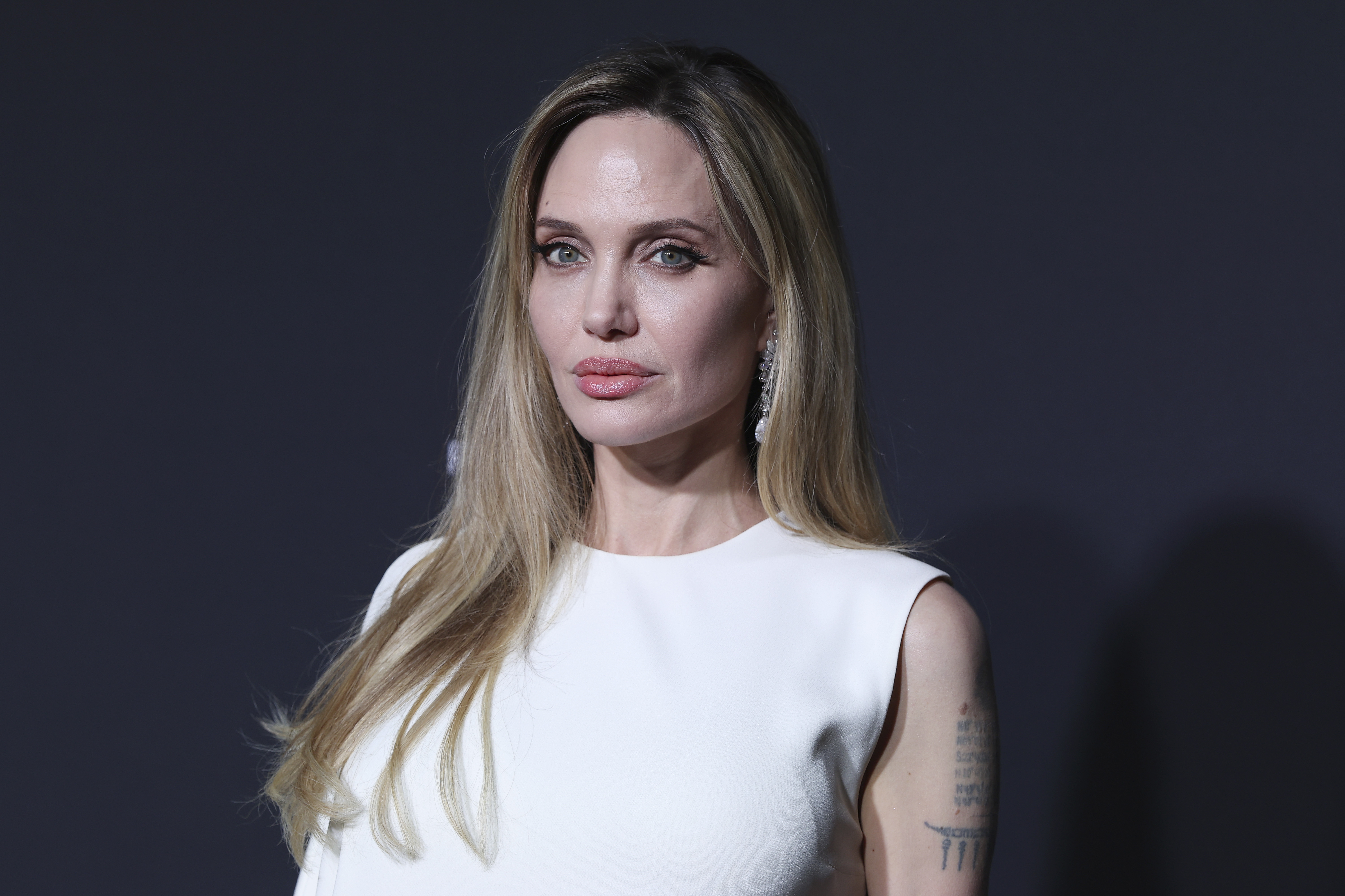 Angelina Jolie attends the photocall for the Chopard Trophy at the 78th annual Cannes Film Festival at Carlton Beach on May 16, 2025 in Cannes, France. | Source: Getty Images