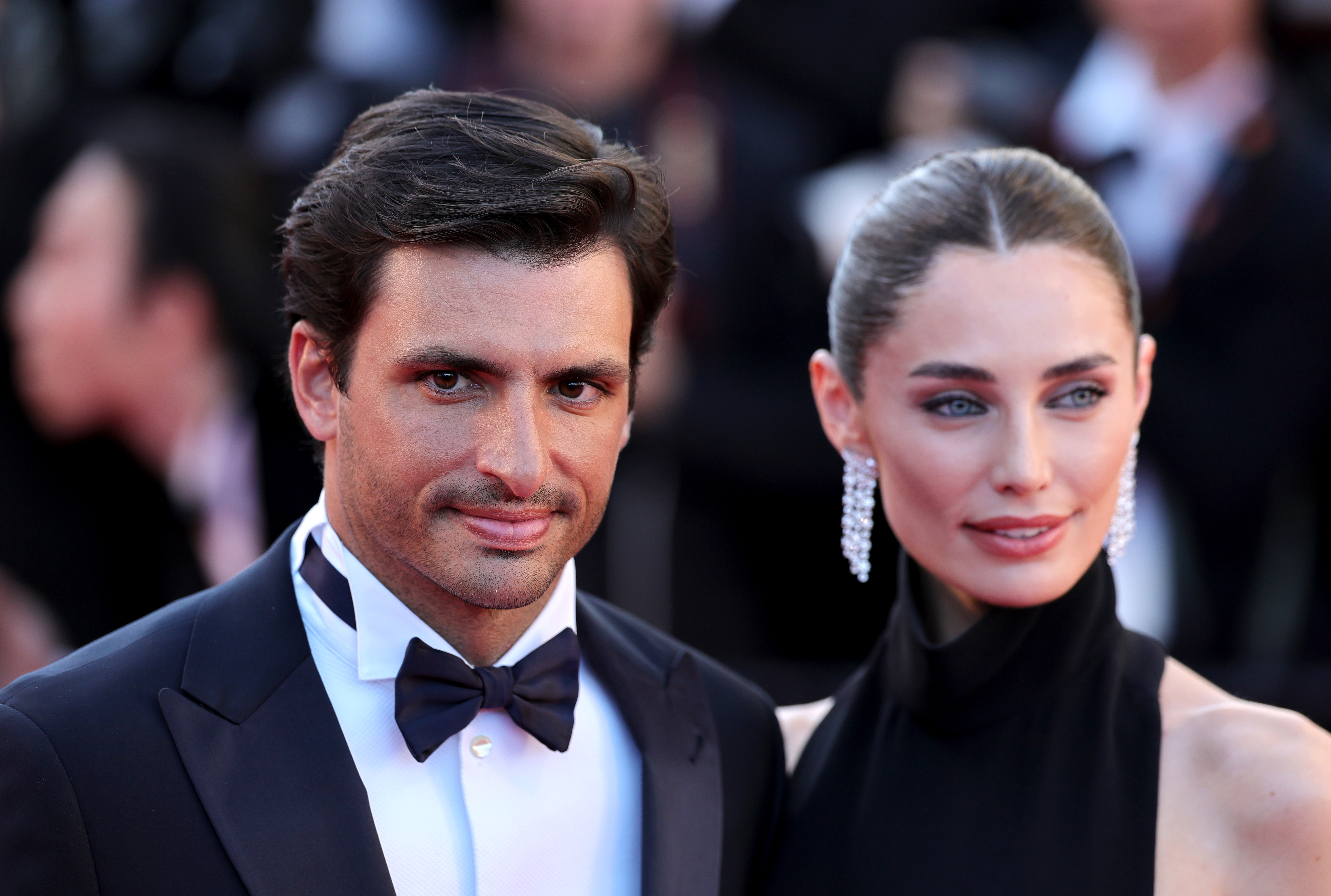 Carlos Sainz Jr. and Rebecca Donaldson attend the opening ceremony and "La Vénus Electrique" (The Electric Venus) screening during the 79th annual Cannes Film Festival at Palais des Festivals on May 12, 2026 in Cannes, France. | Source: Getty Images