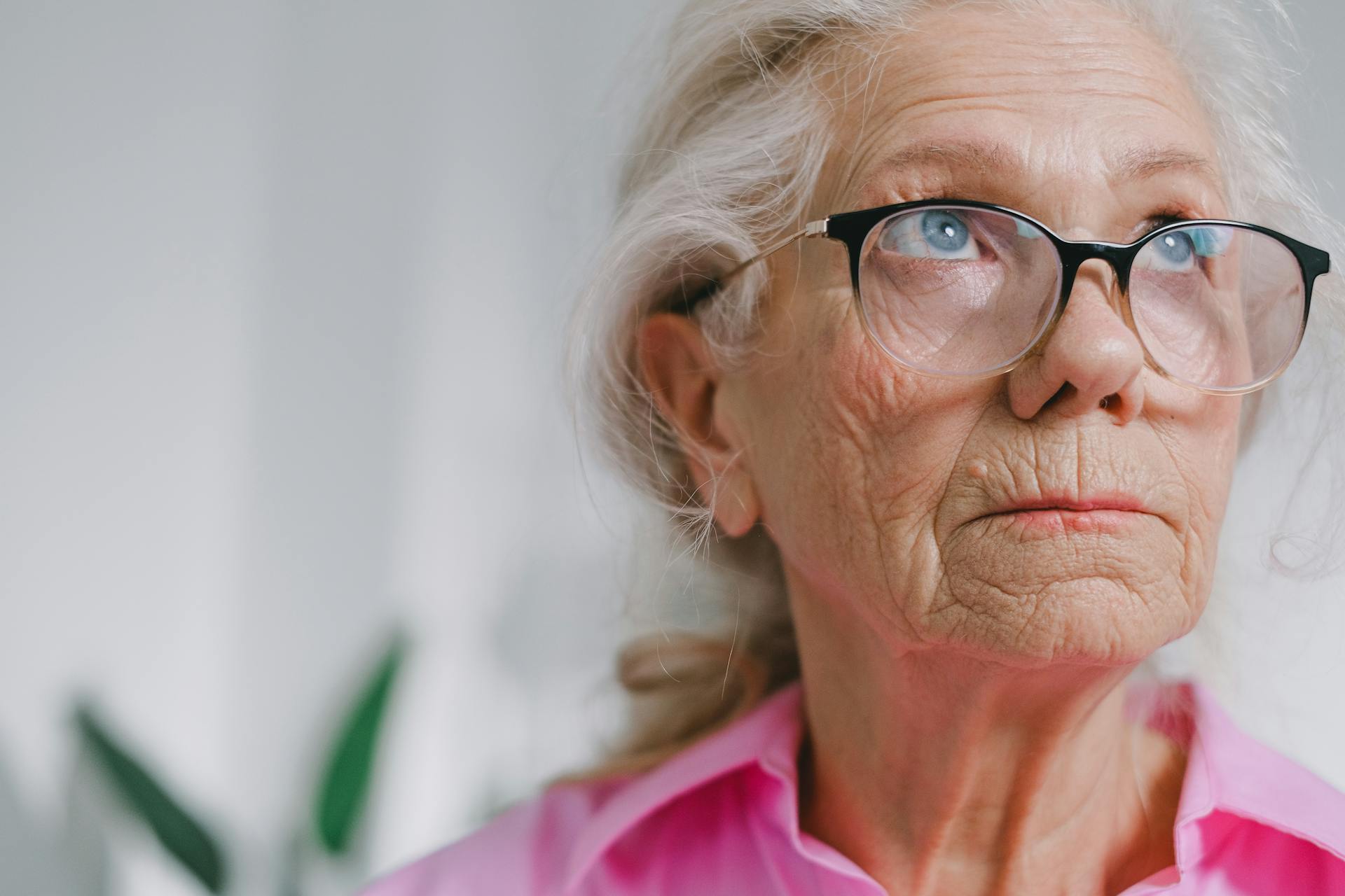 A close-up shot of a woman's face as she looks up | Source: Pexels