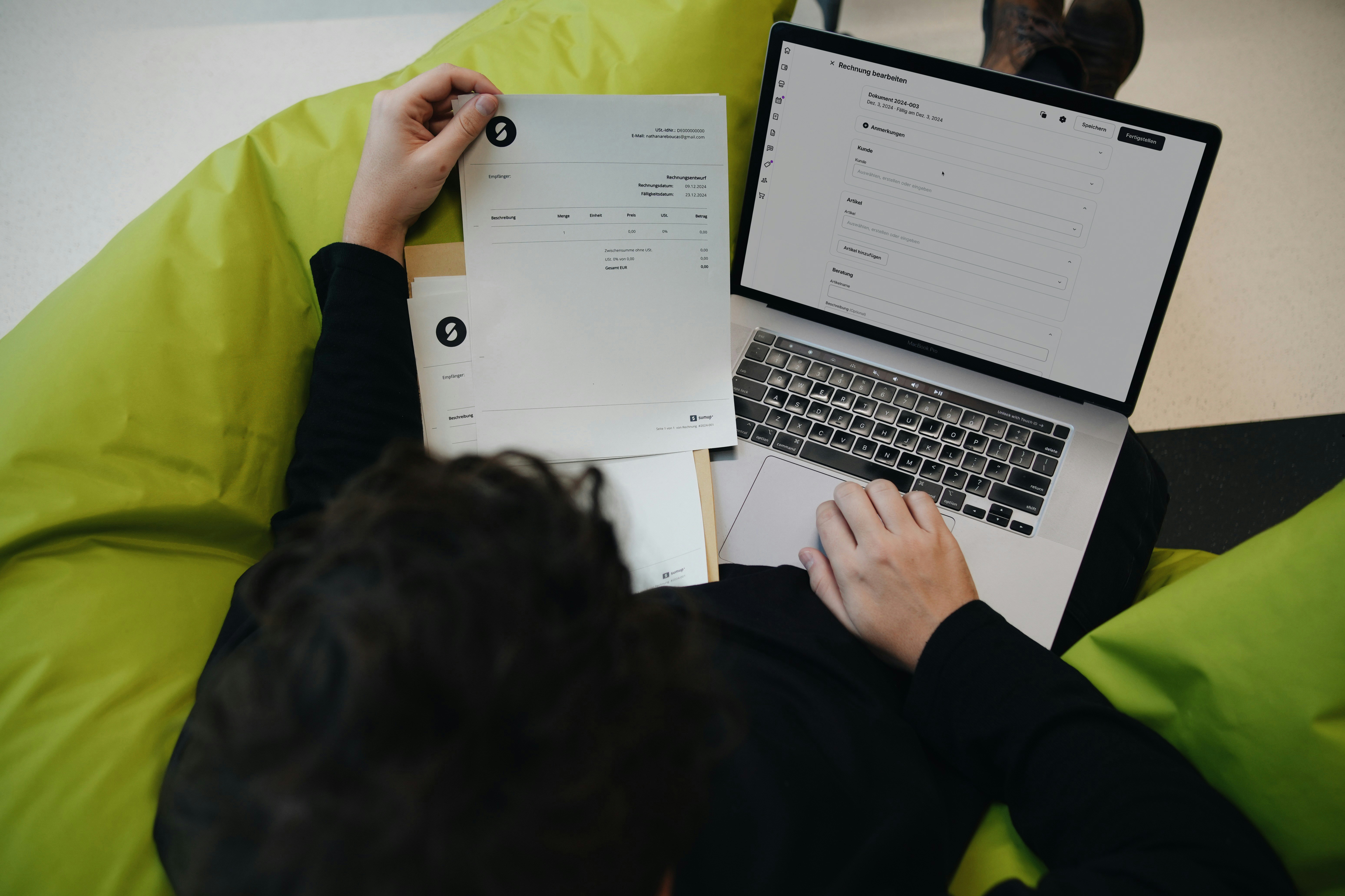 A person looking at invoices | Source: Unsplash