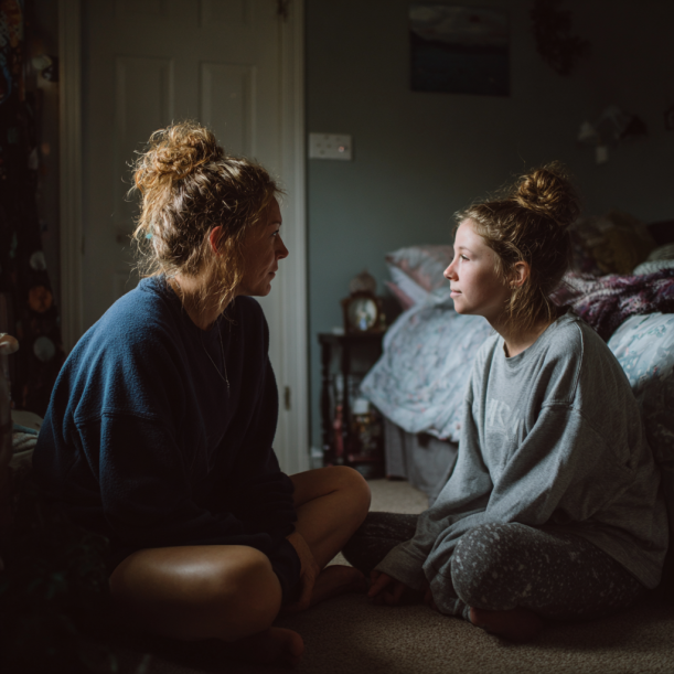 A mother and her daughter having a heartfelt conversation | Source: Midjourney