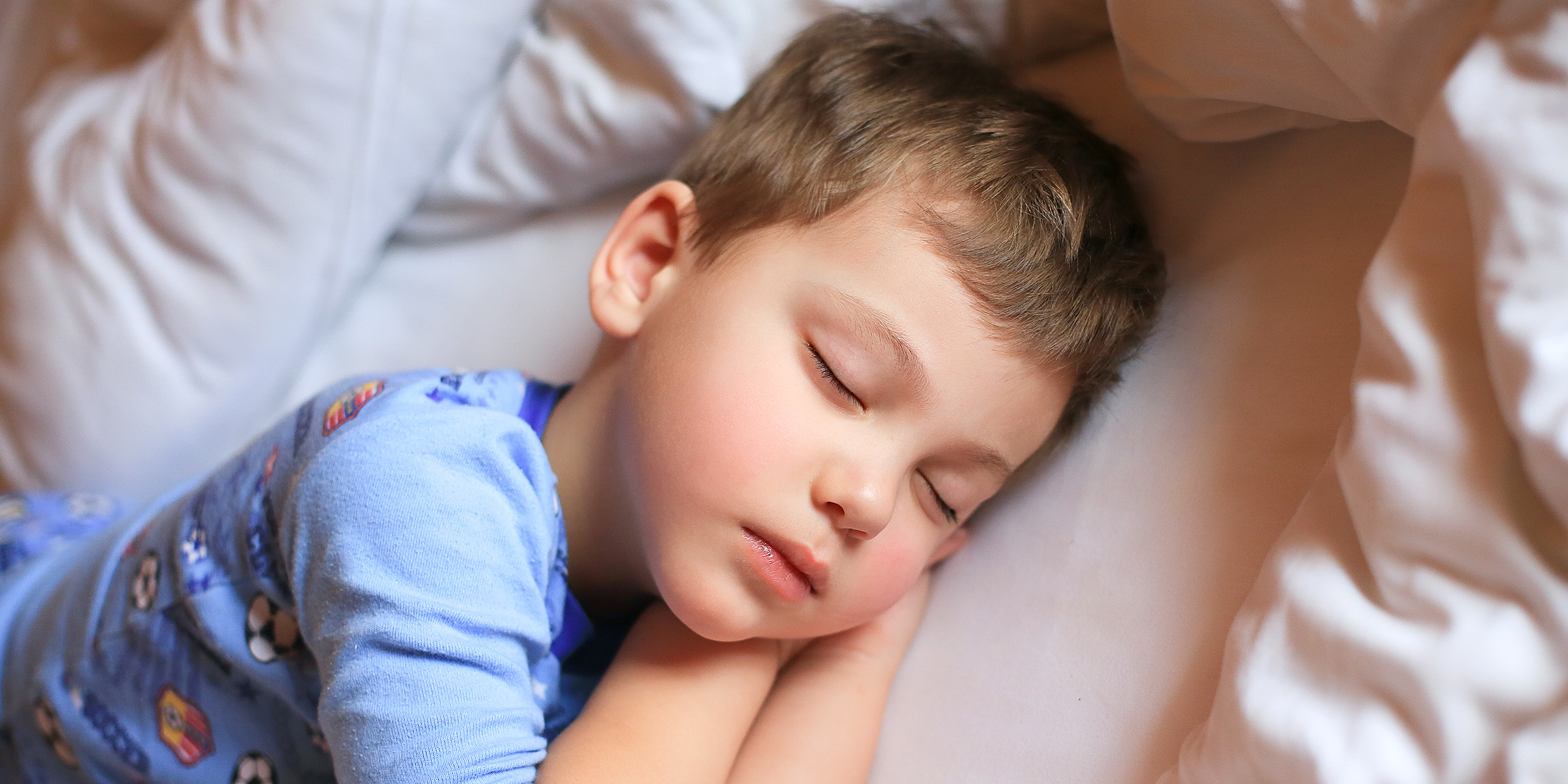 A sleeping little boy | Source: Shutterstock