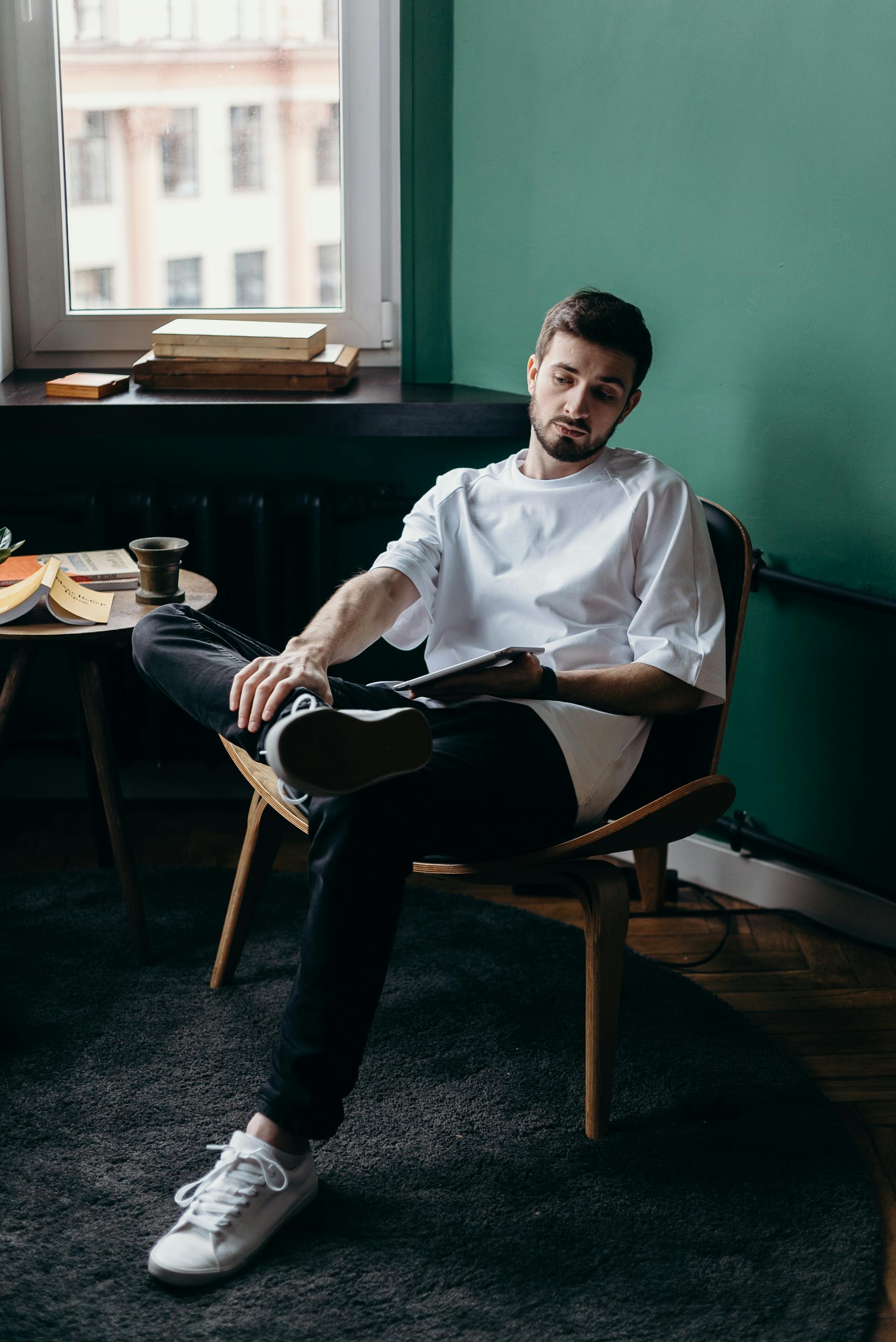 A thoughtful man sitting on a chair | Source: Pexels