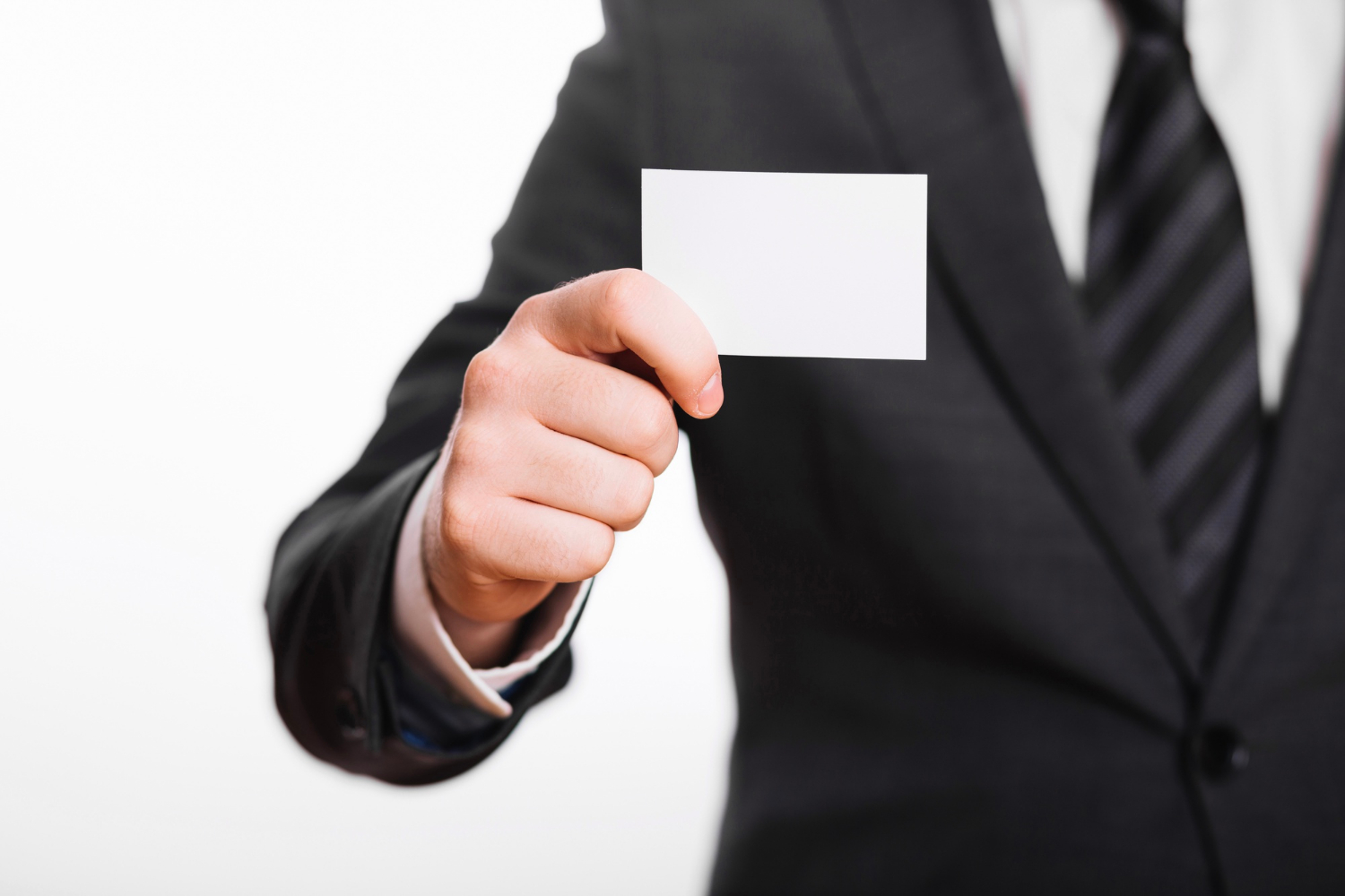 A man holding a plain white card | Source: Freepik