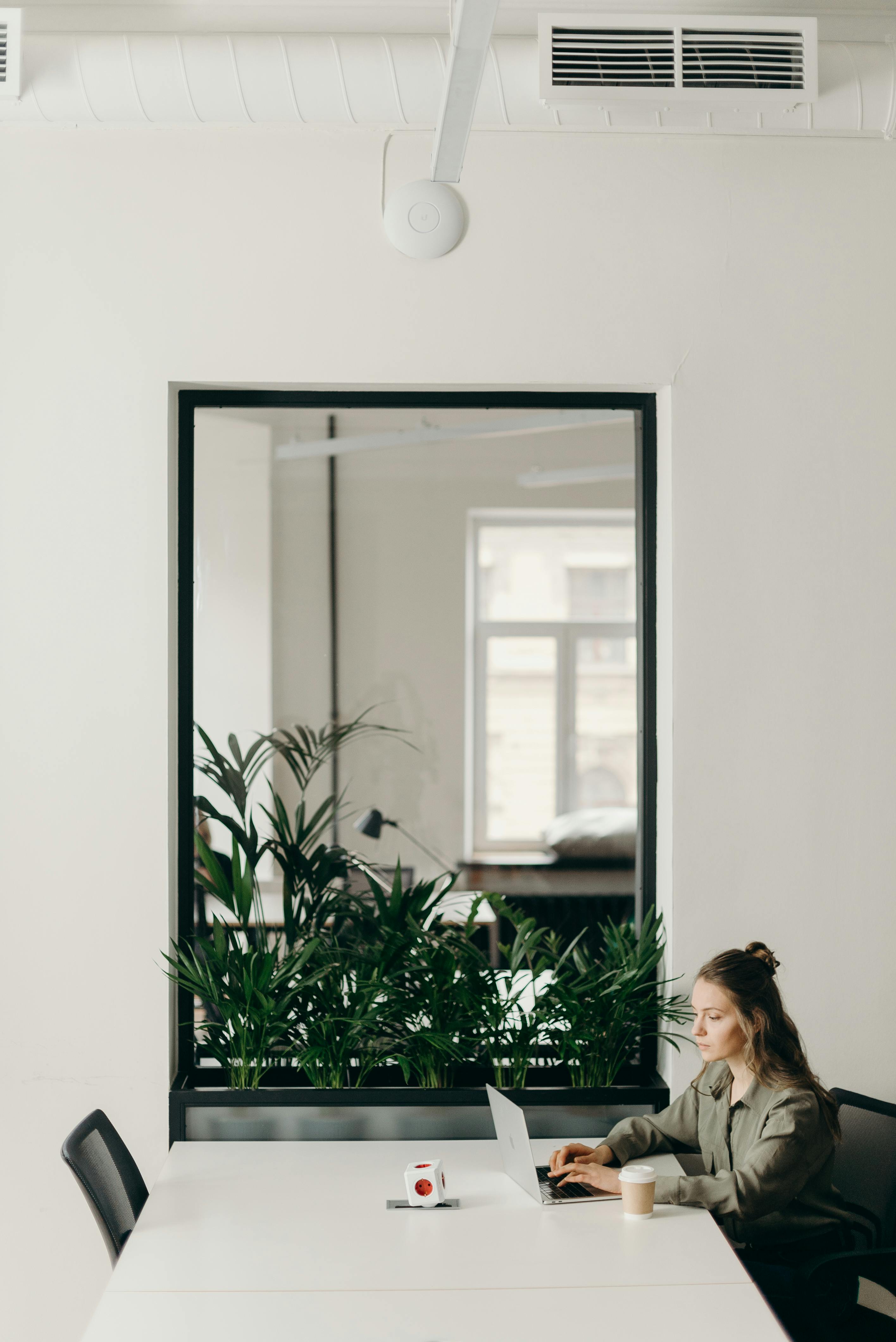 A woman typing on a laptop | Source: Pexels