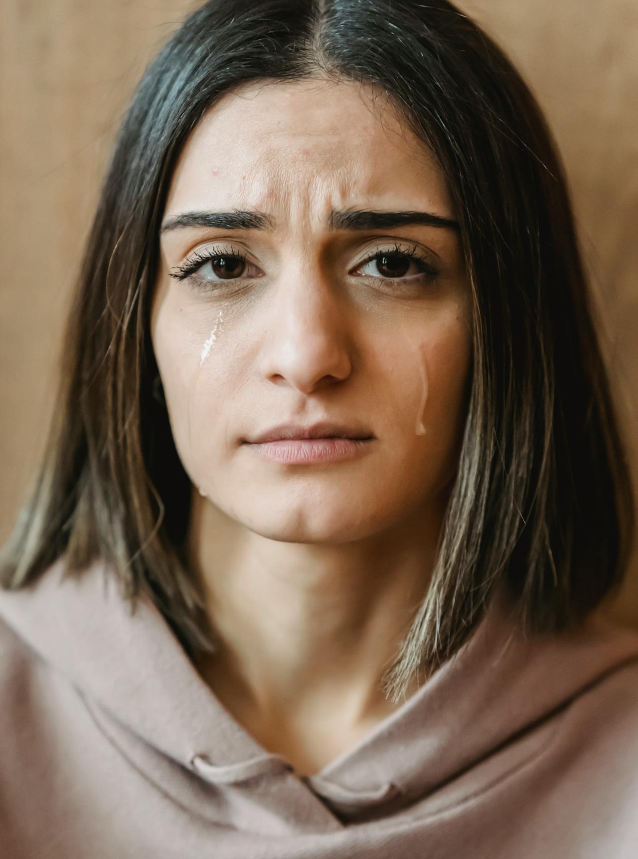 A teary-eyed woman | Source: Pexels