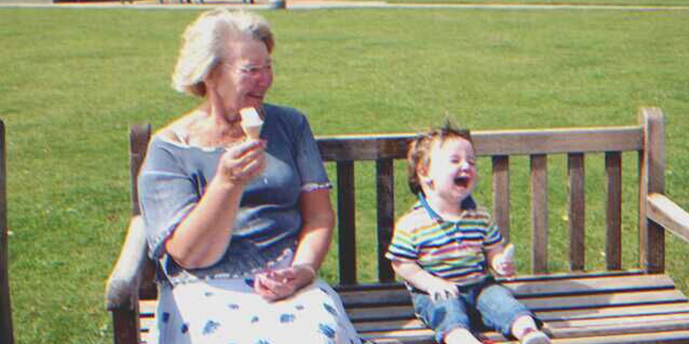 An old lady laughing next to a happy baby | Source: Flickr/Julian Tysoe