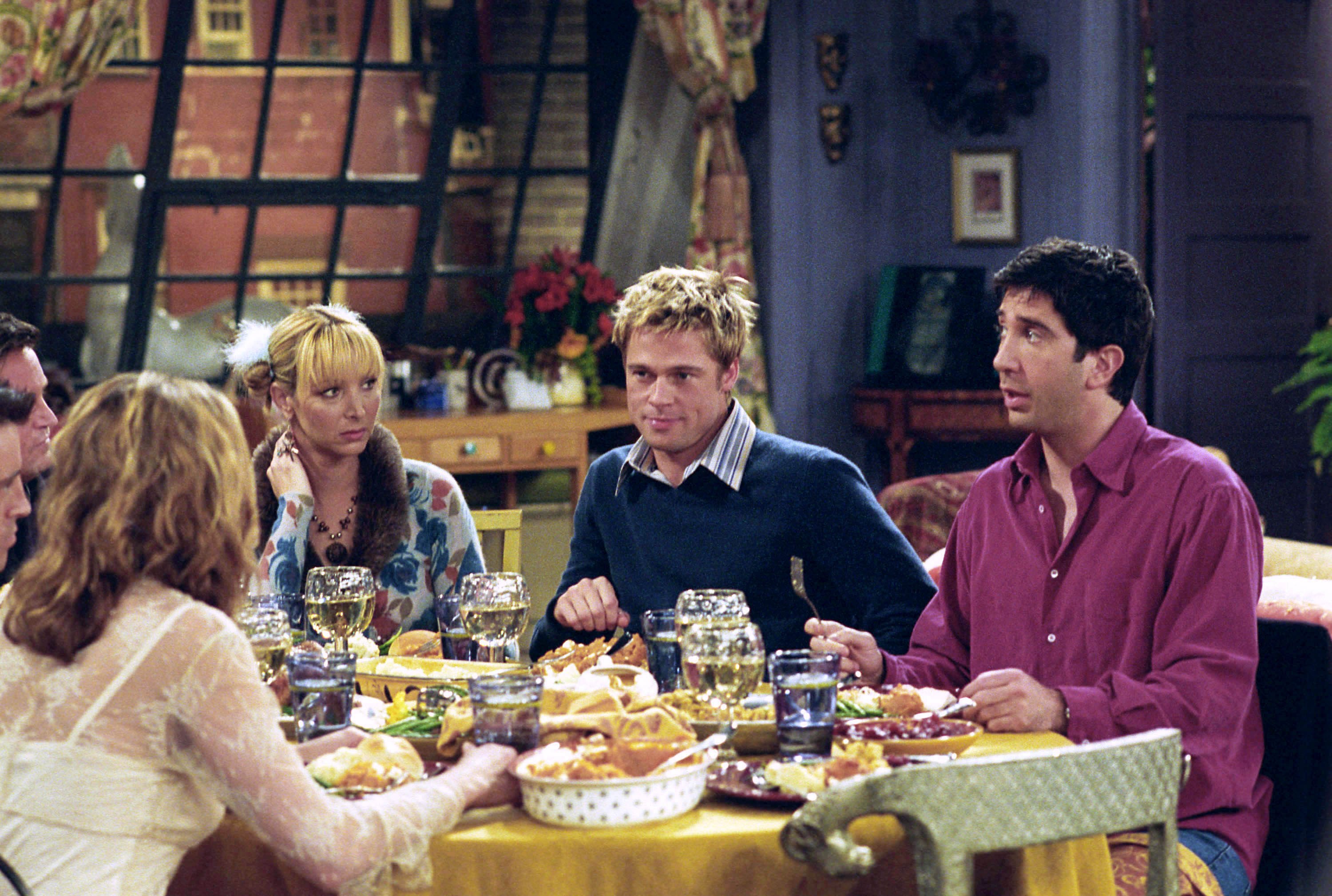 Jennifer Aniston as Rachel Green, Lisa Kudrow as Phoebe Buffay, Brad Pitt as Will Colbert, David Schwimmer as Ross Geller on a "FRIENDS" episode that aired on November 22, 2001. | Source: Getty Images