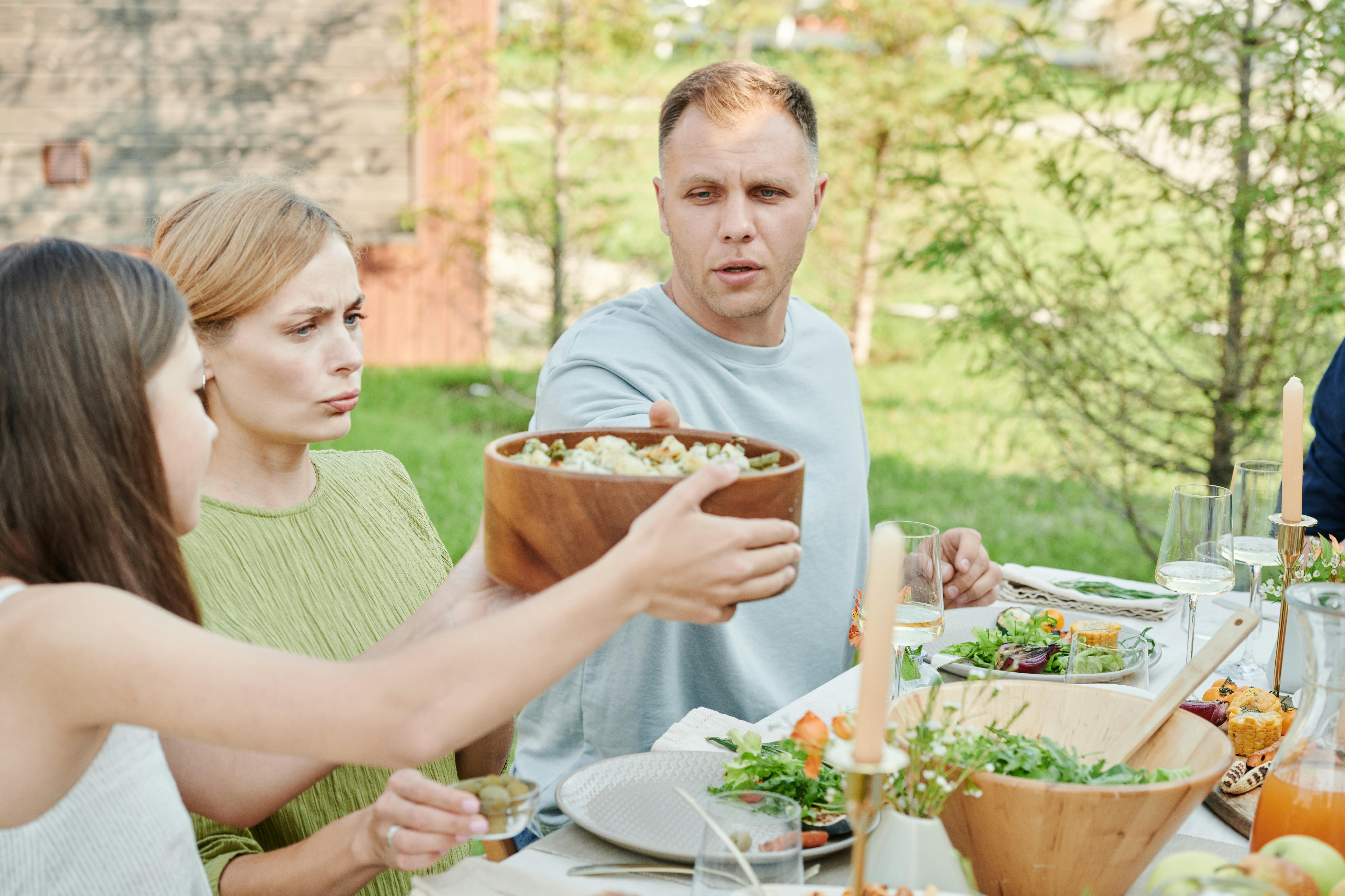 Family enjoying a meal | Source: Pexels