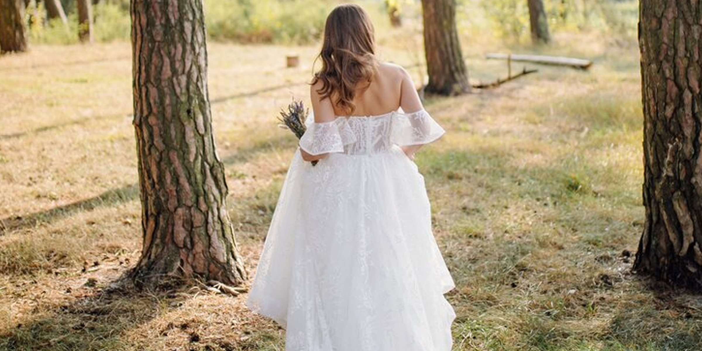 A woman in a wedding dress in the forest | Source: Freepik