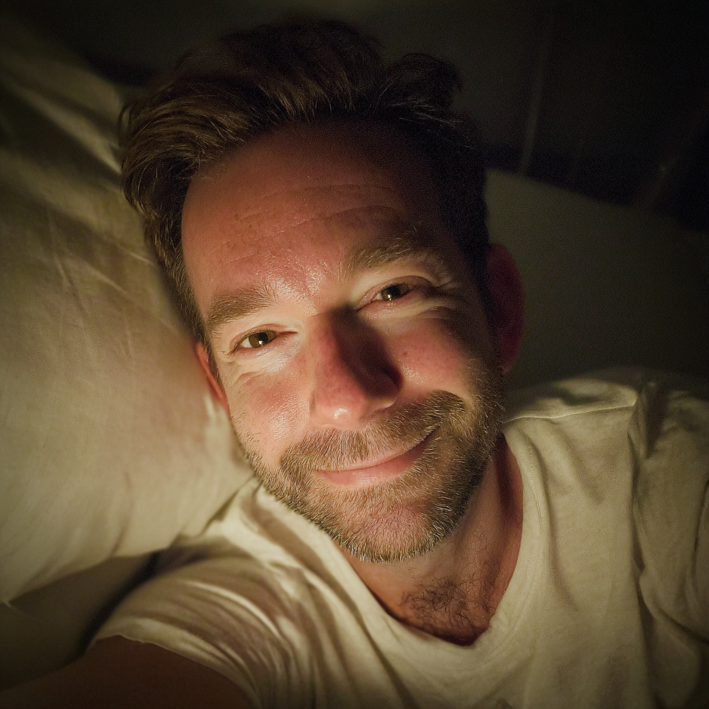 A smiling man laying in bed | Source: Midjourney
