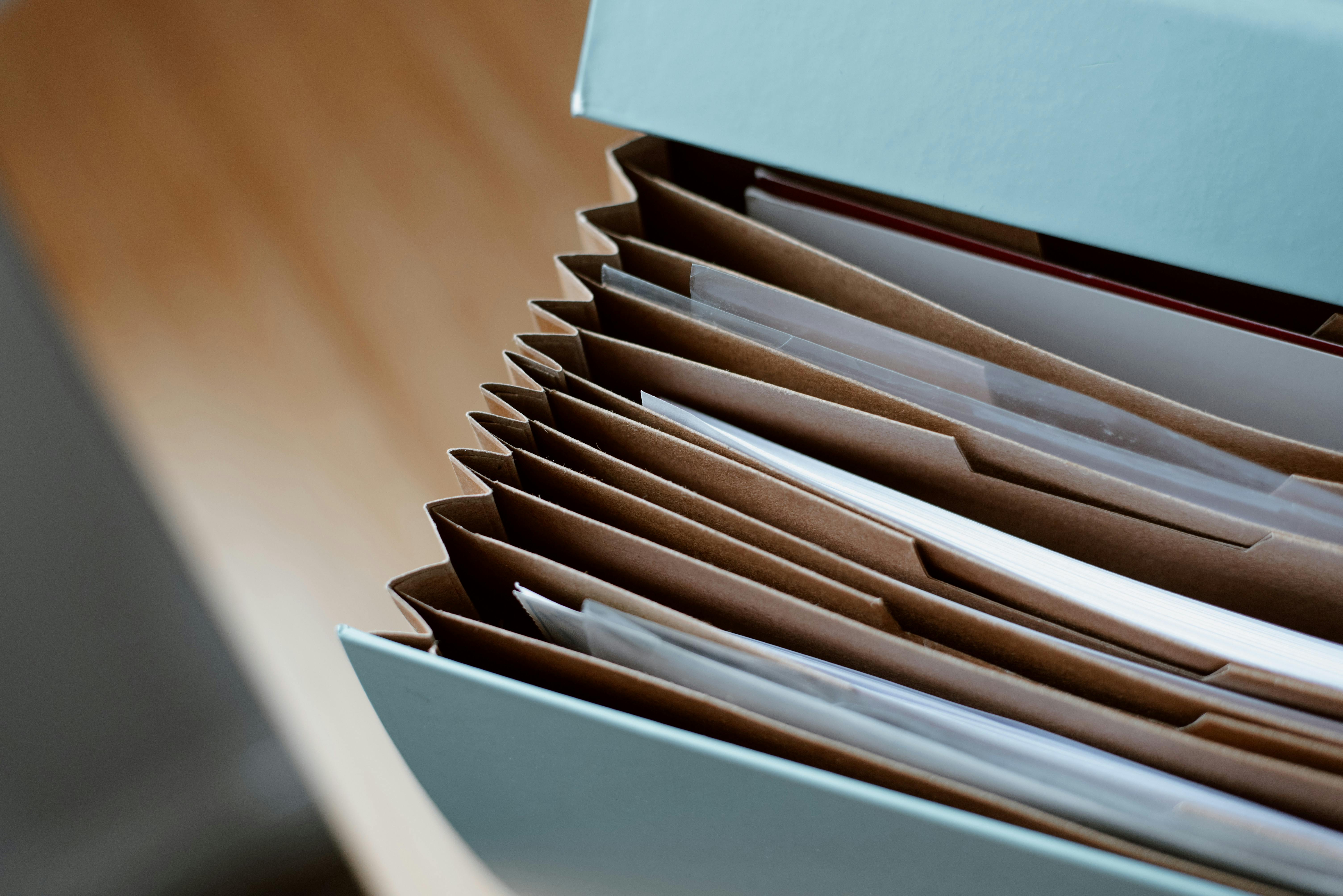 A folder with documents | Source: Pexels