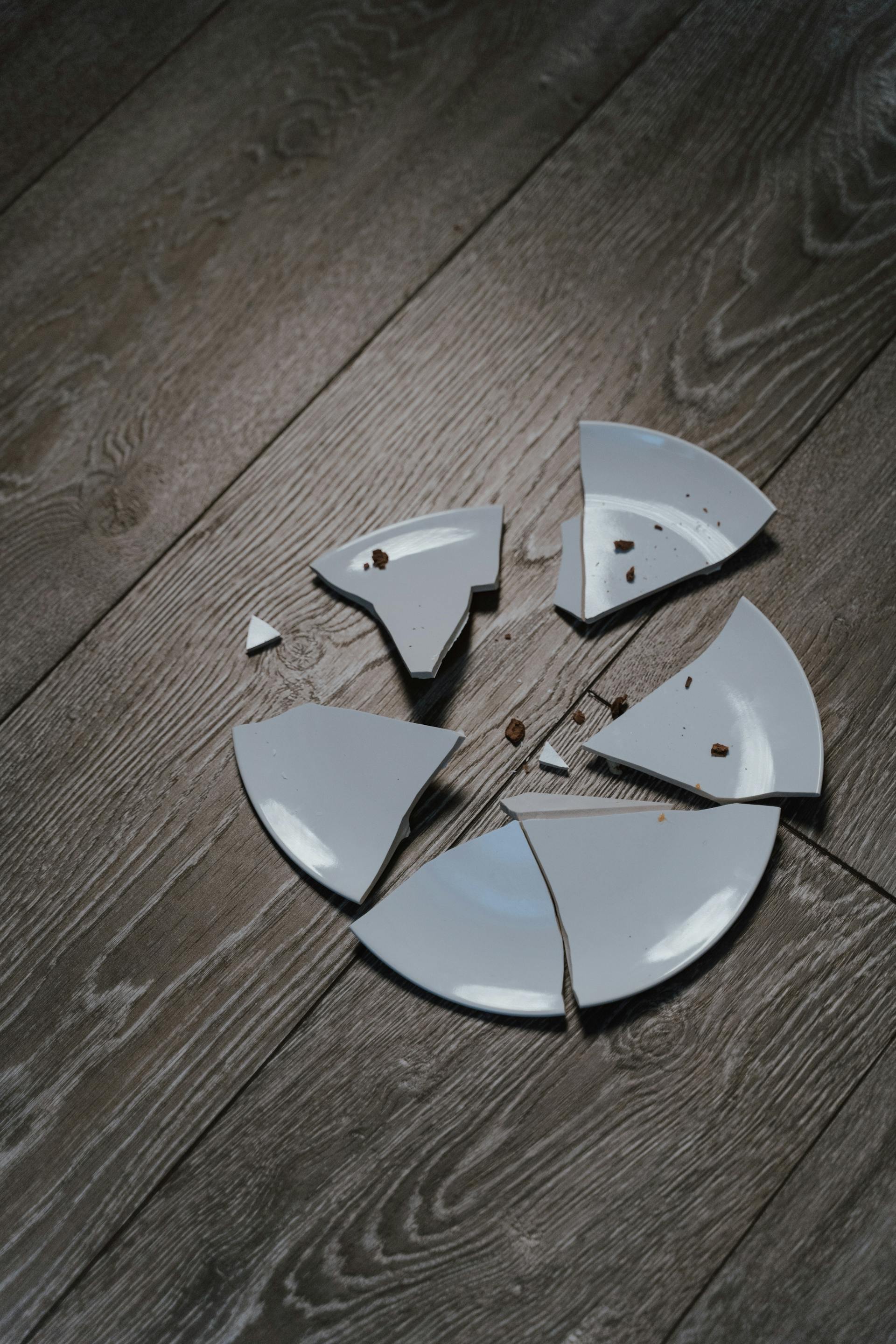 A broken ceramic plate on the floor | Source: Pexels