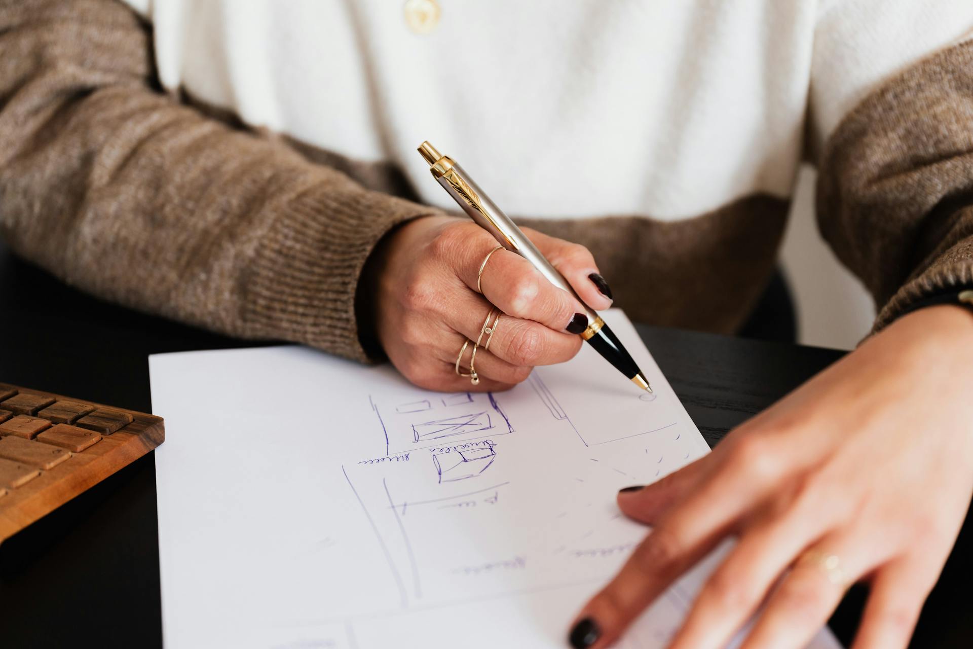 A close-up shot of a woman writing | Source: Pexels