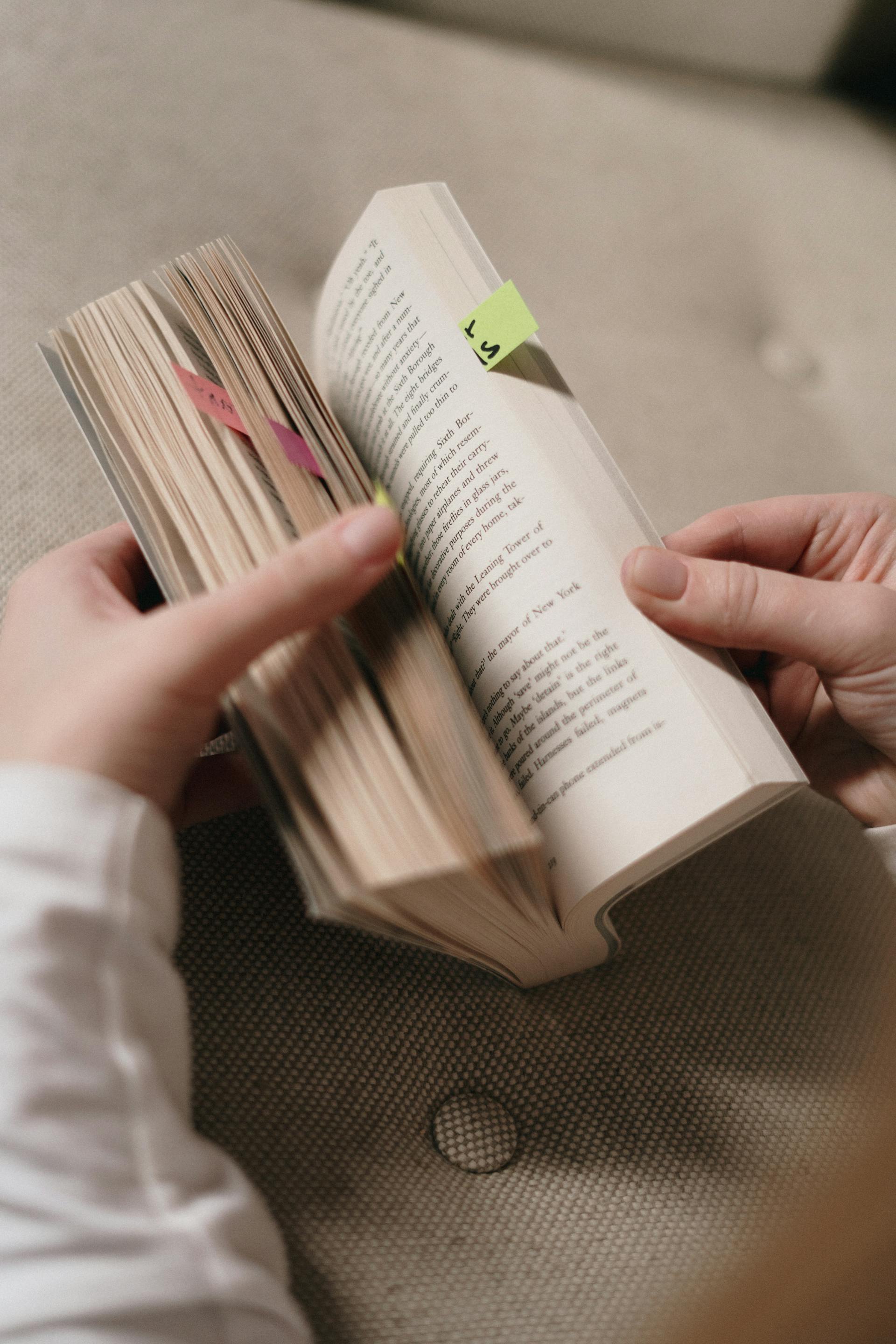 A person holding a book | Source: Pexels
