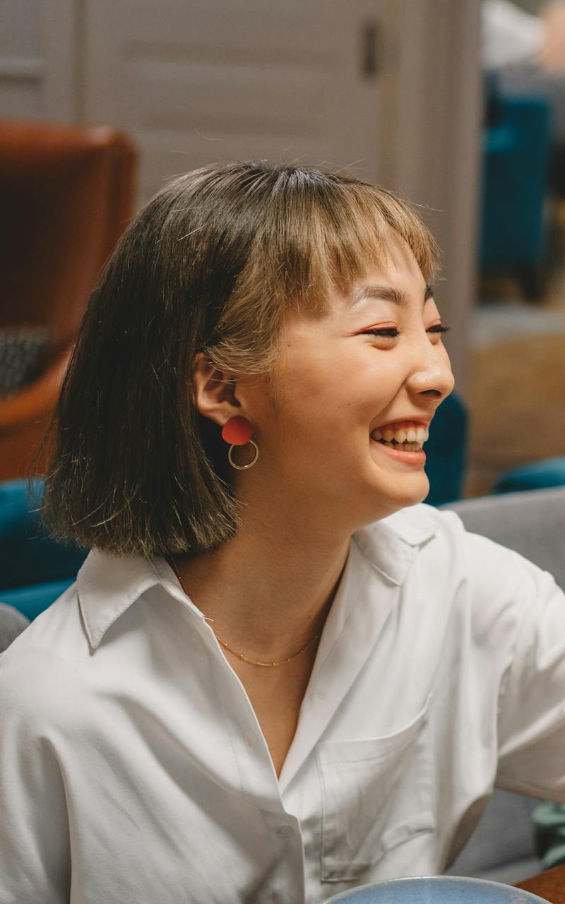 A woman smiling | Source: Pexels