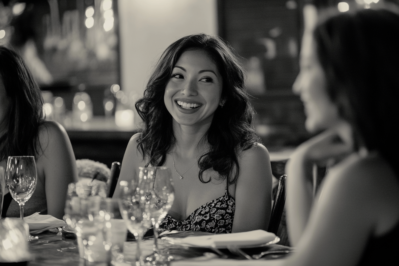 Women seated at a dinner table | Source: Midjourney