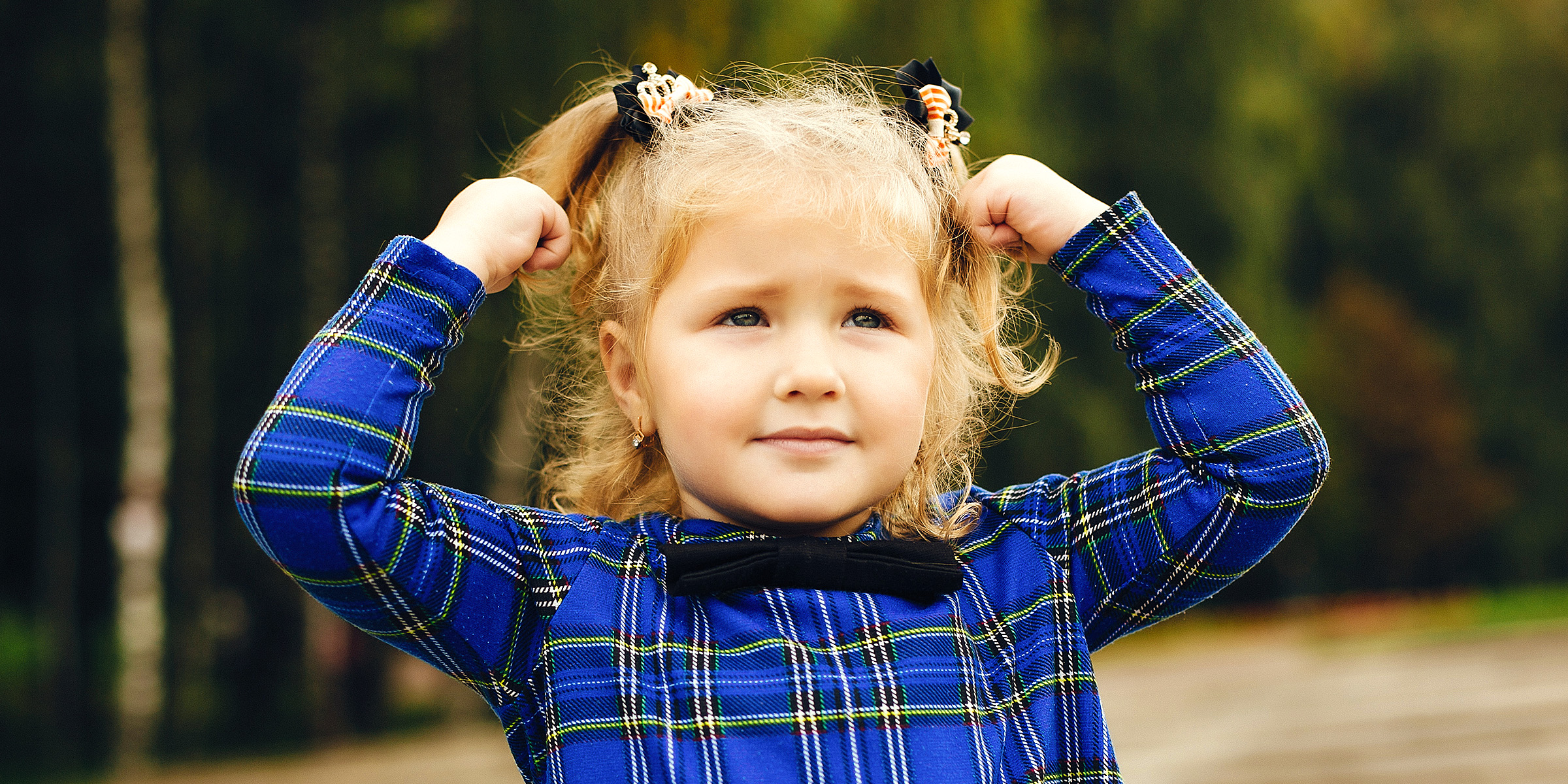 A little girl smiling | Source: Freepik