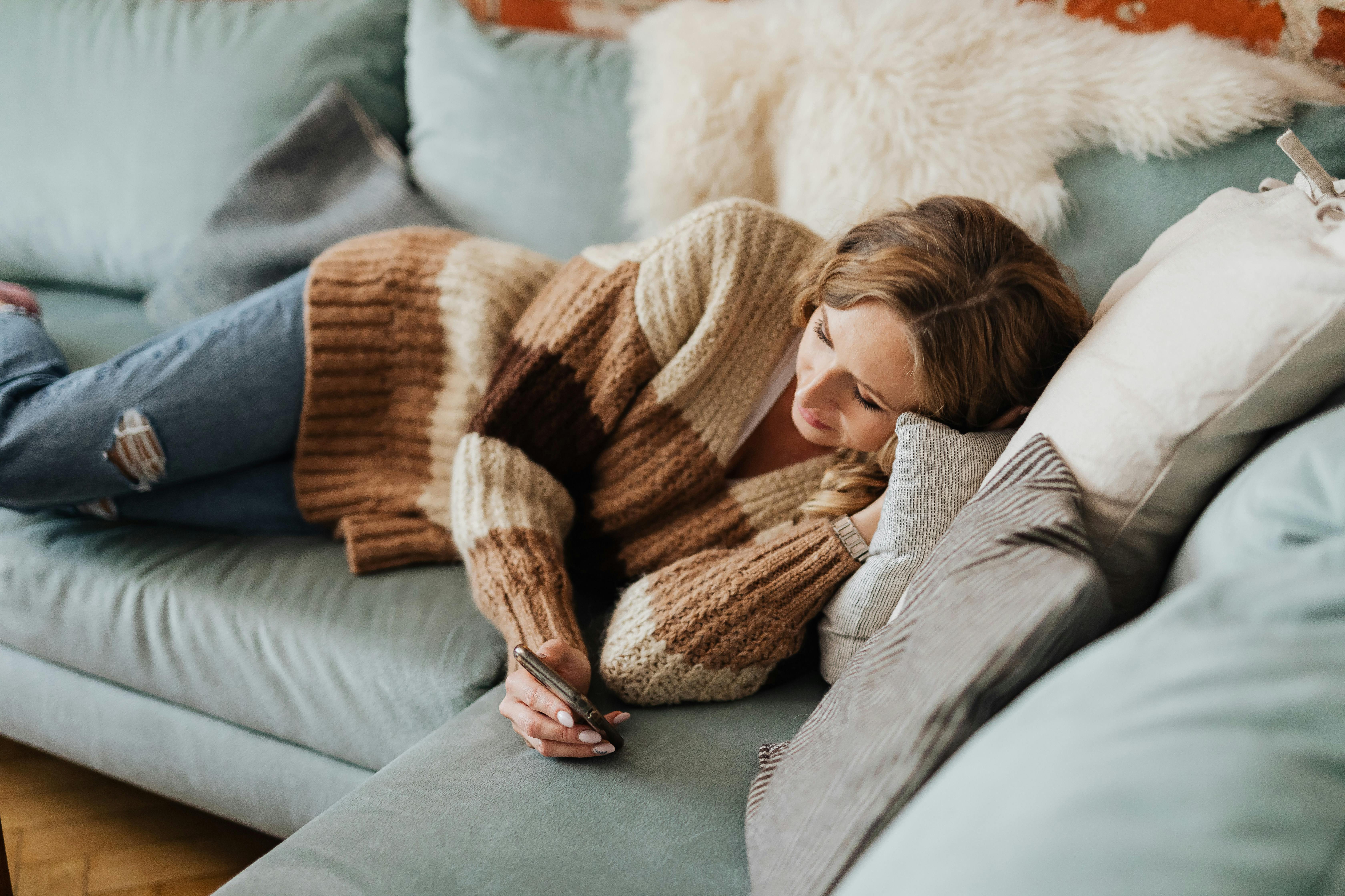A woman checking her phone | Source: Pexels