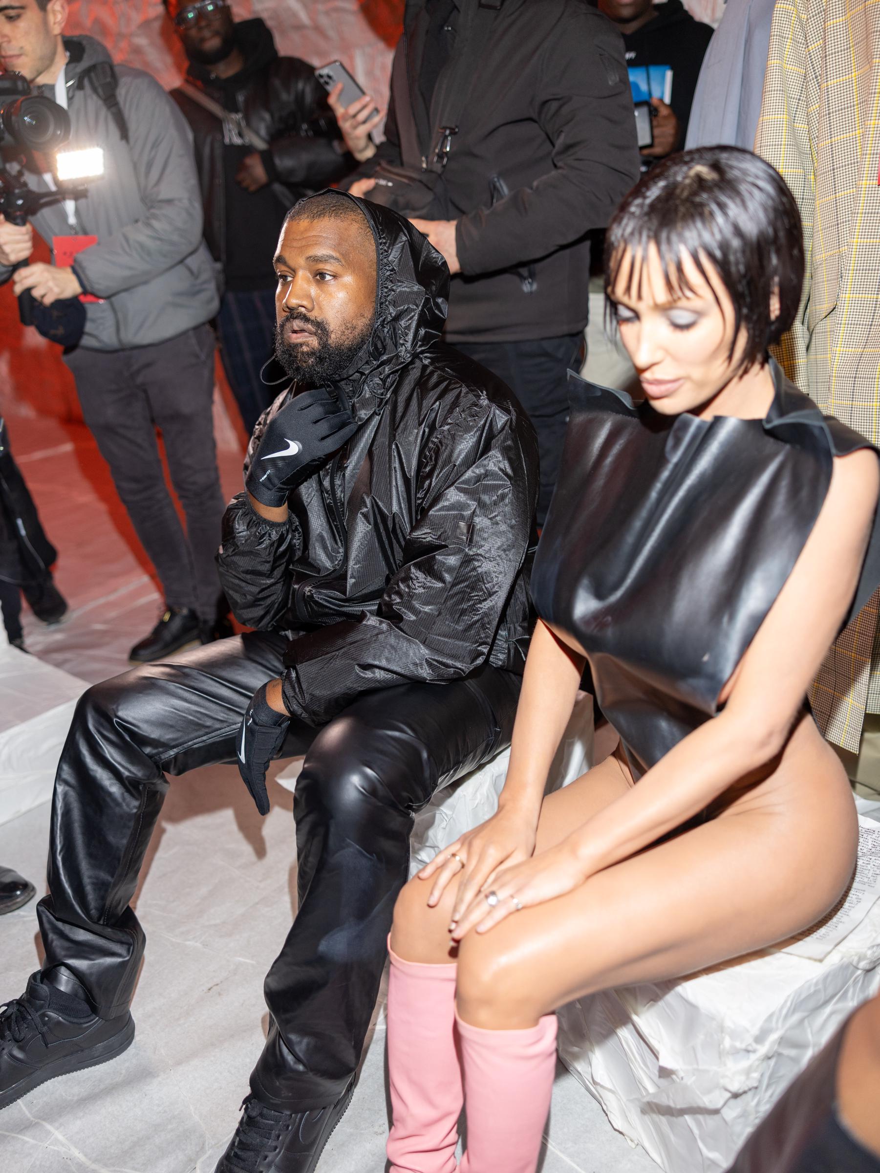 Kanye West and Bianca Censori at the Marni fashion show during the Milan Fashion Week Womenswear Fall/Winter on February 23, 2024, in Milan, Italy | Source: Getty Images