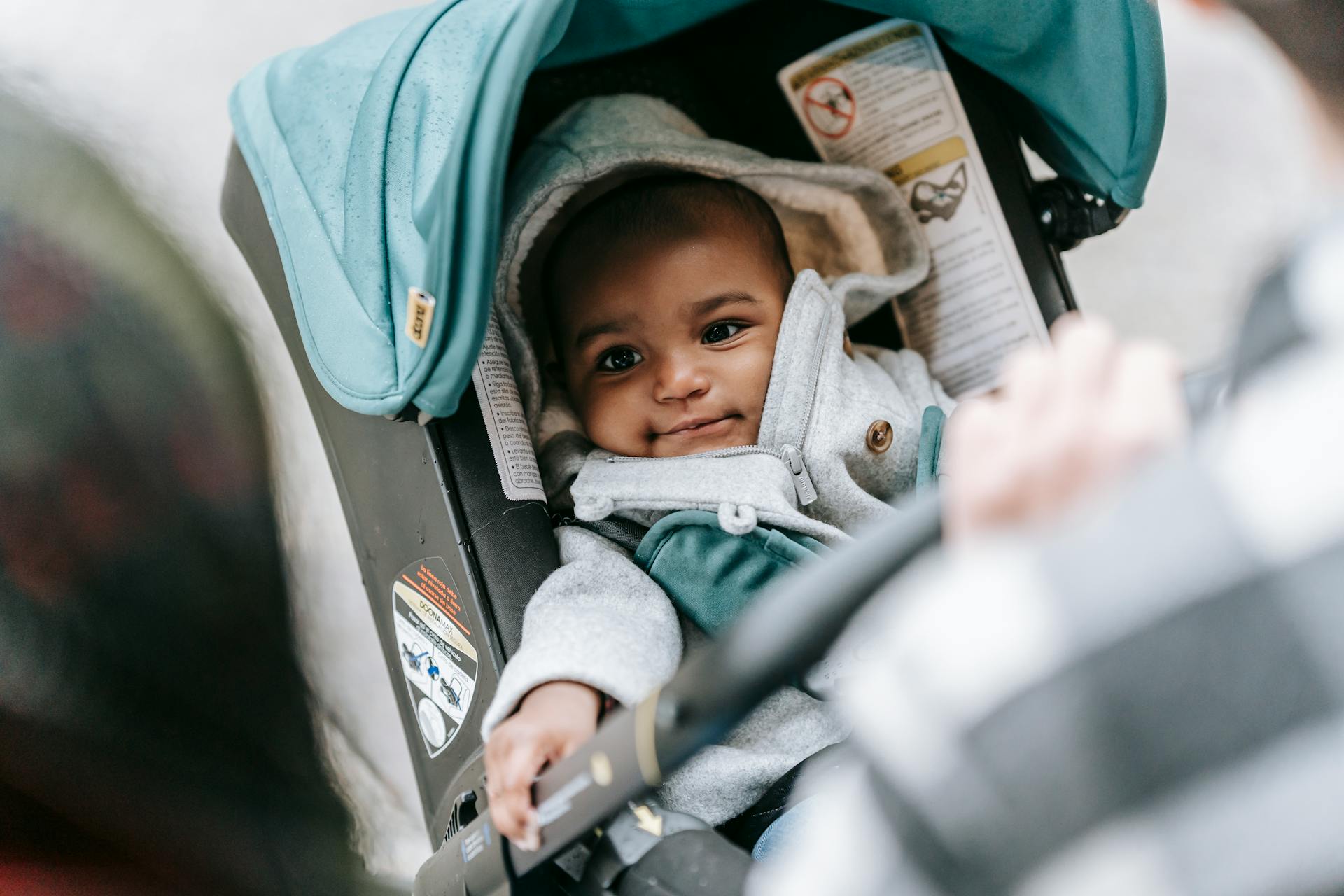 A baby in a carrier | Source: Pexels