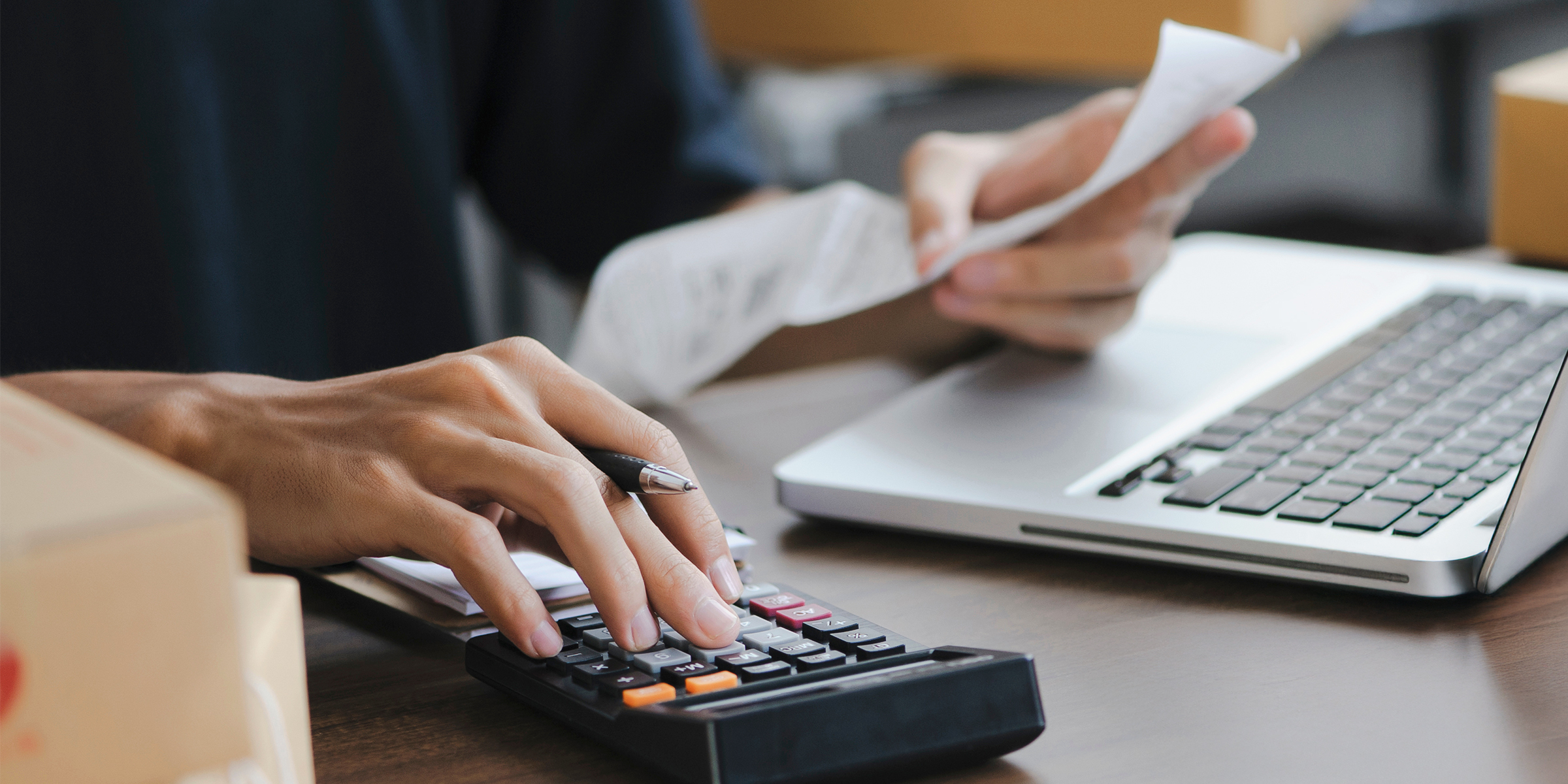 A person using a calculator | Source: Shutterstock