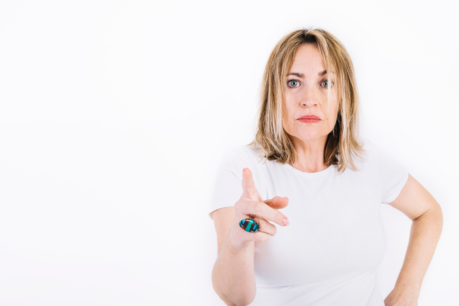 A furious senior woman arguing | Source: Freepik