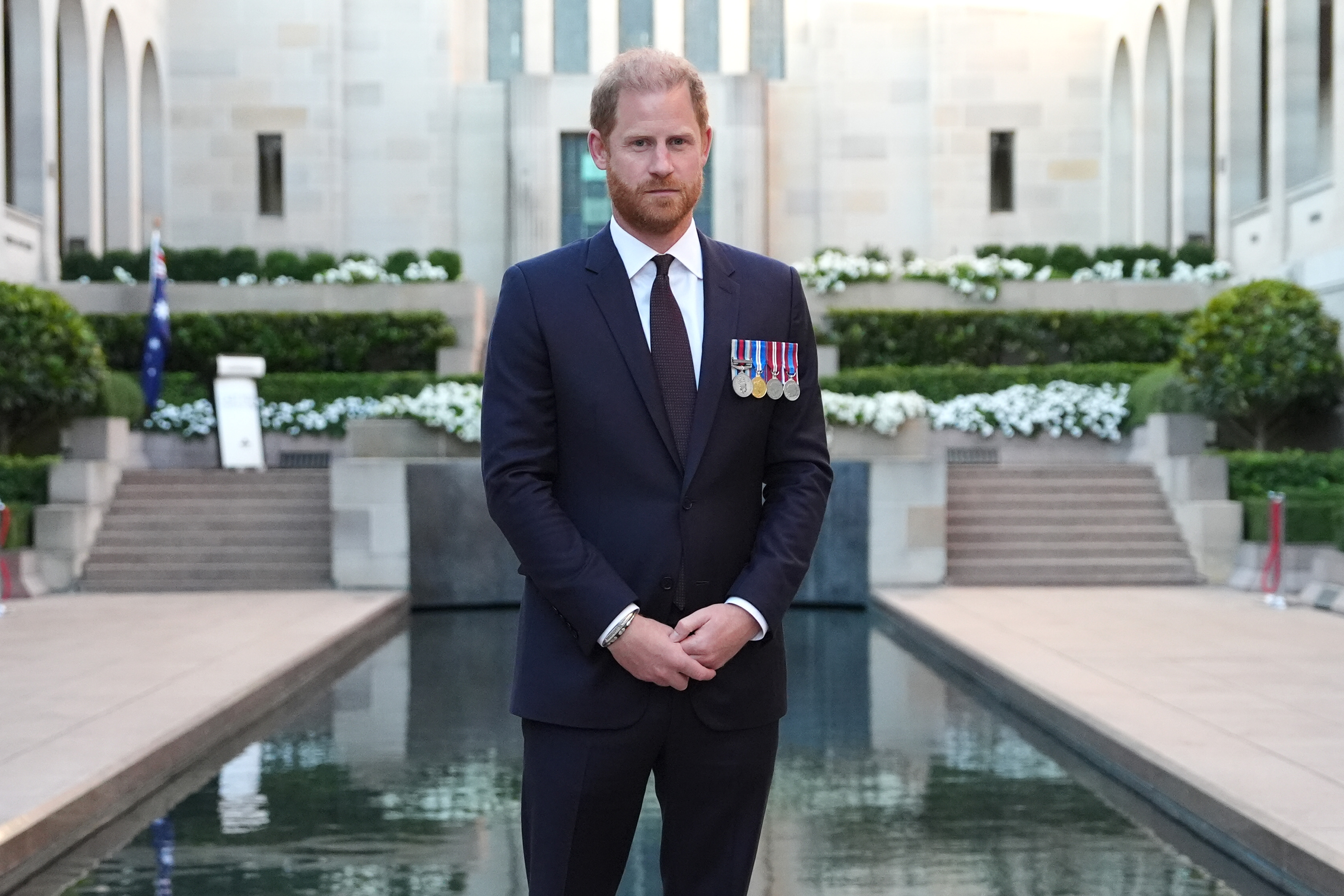 Prince Harry, Duke of Sussex by the Pool of Reflection after the Last Post Ceremony at the Australian War Memorial on April 15, 2026 in Canberra, Australia. | Source: Getty Images