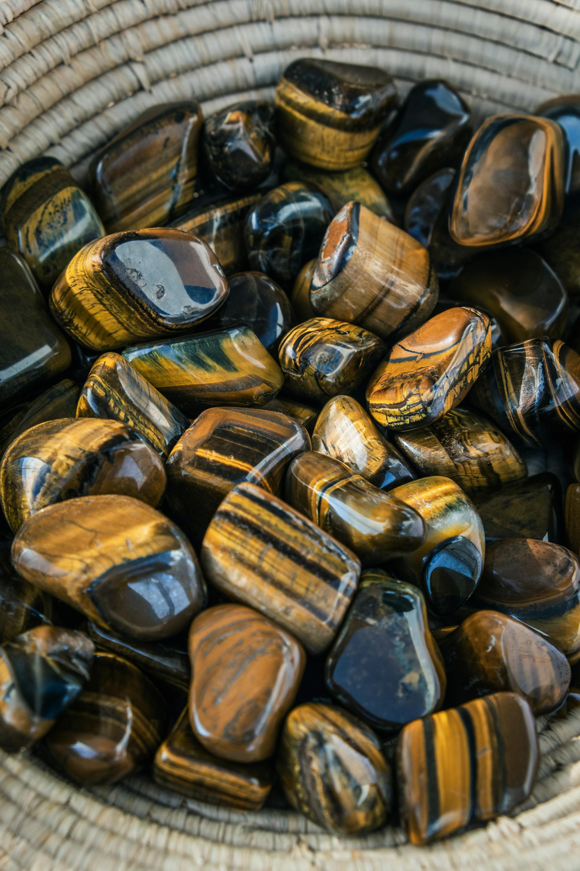 Tumbled Tiger's Eye stones  | Source: Pexels