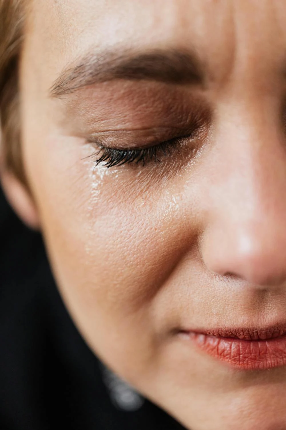 A woman with tears in her eyes | Source: Pexels