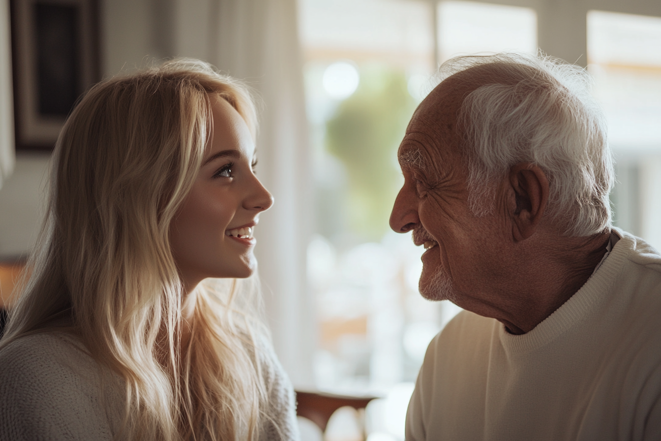 A young woman speaking to her grandfather | Source: Midjourney