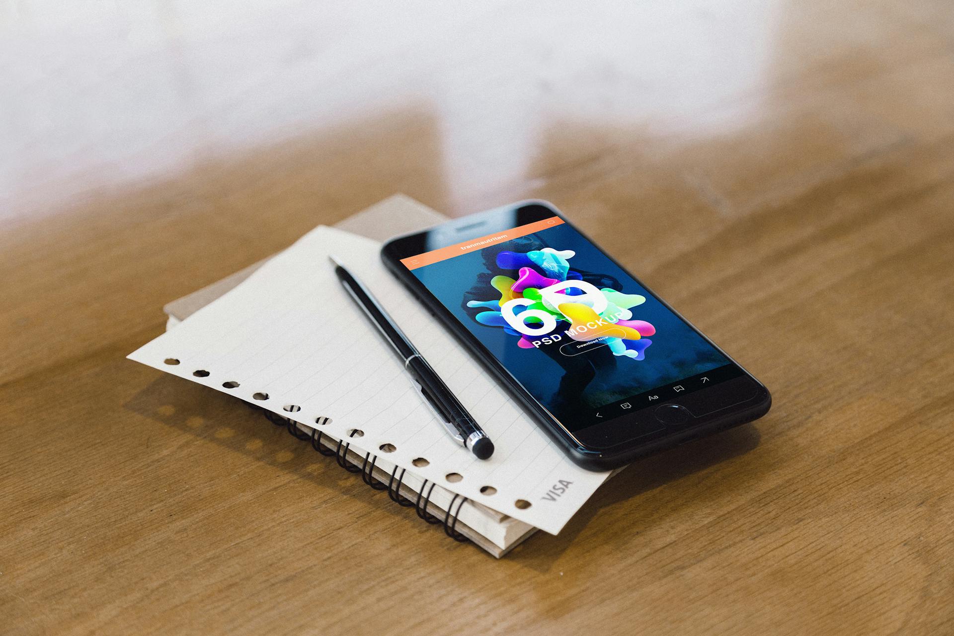 A phone on a desk | Source: Pexels