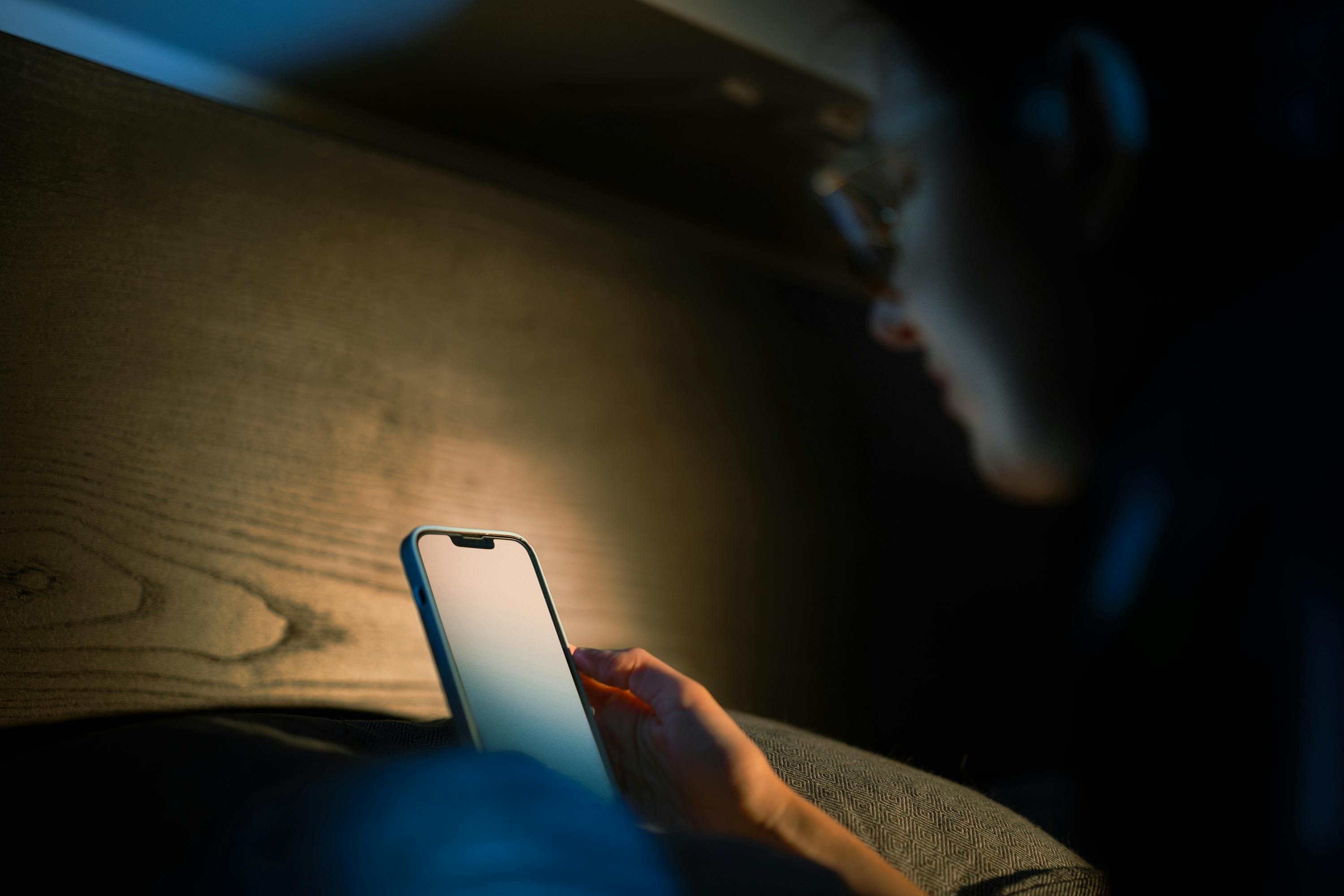Person checking on phone | Source: Pexels