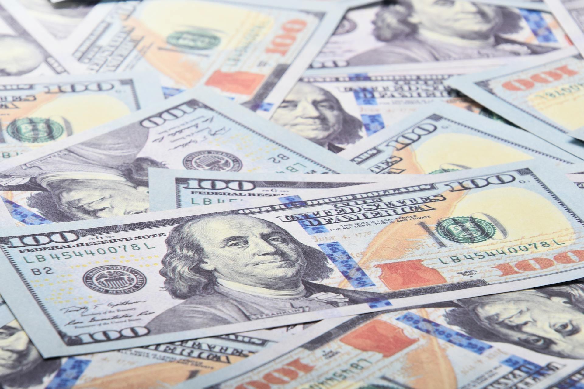 A closeup shot of 100 Dollar Bills | Source: Pexels