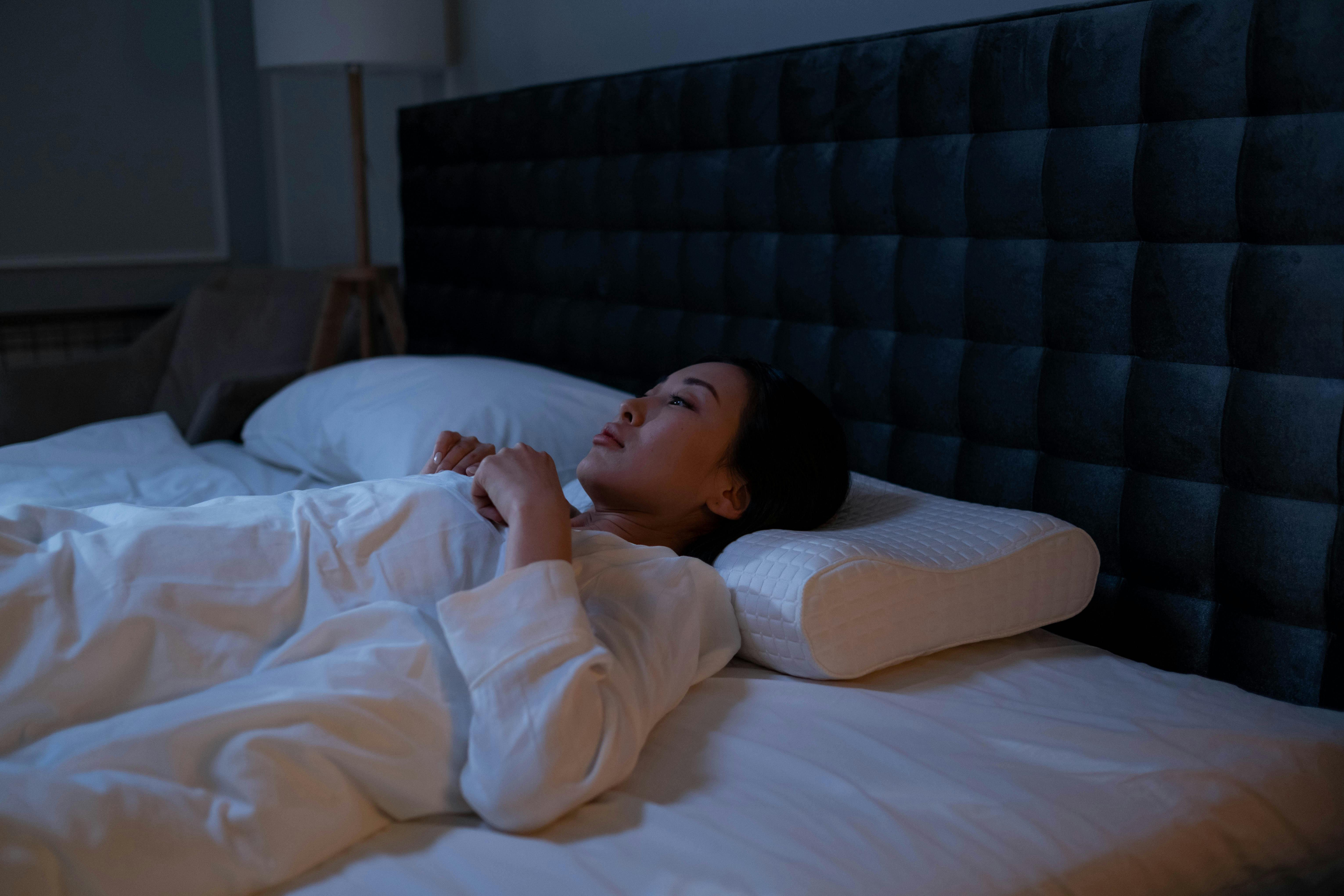 A woman lying on the bed | Source: Pexels