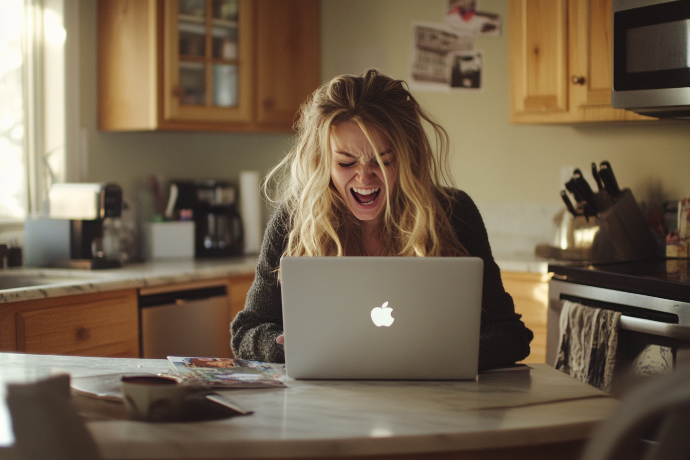 A woman cackling while using her laptop | Source: Midjourney